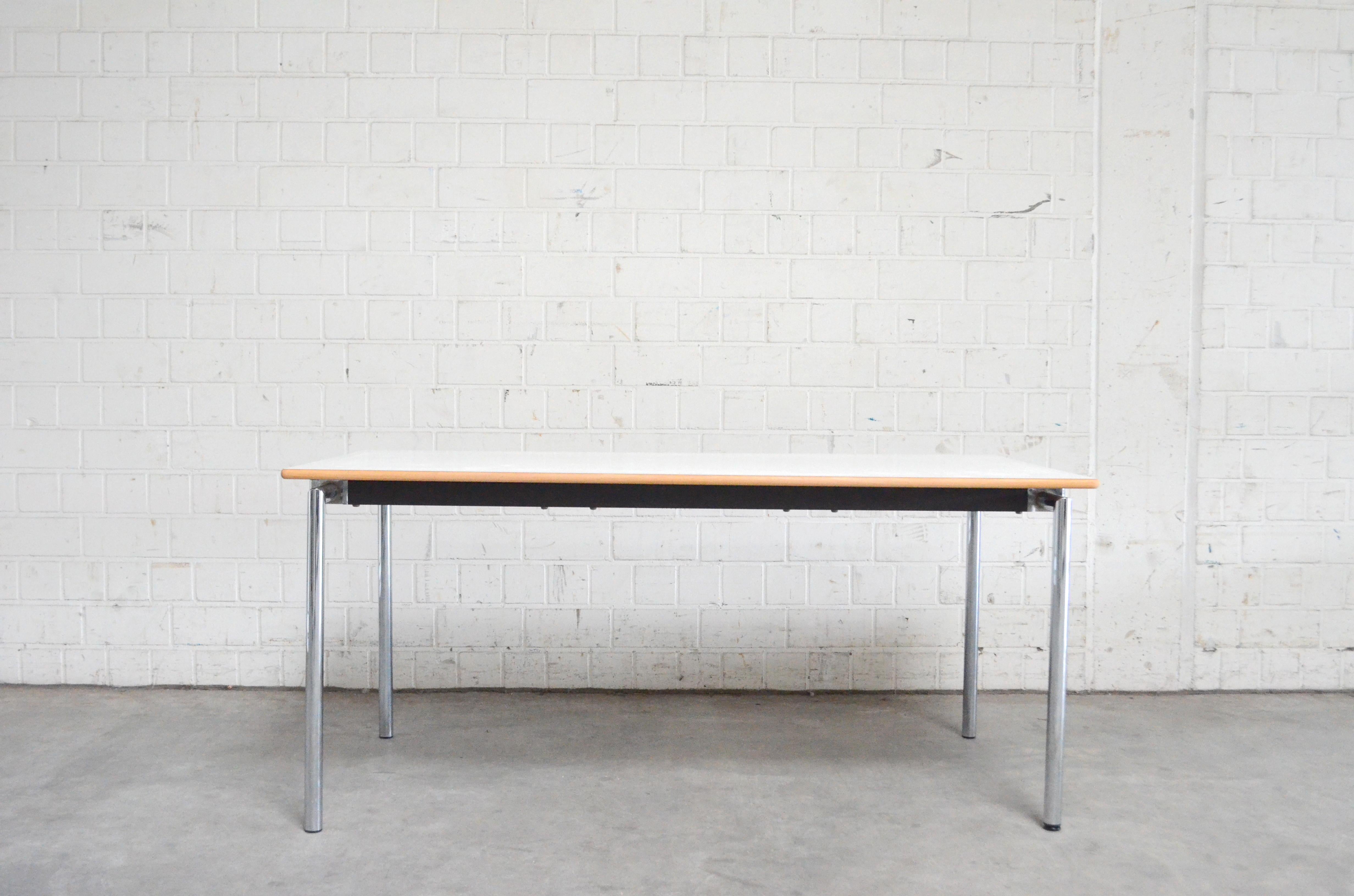 Danish table by Søren Nielsen & Thore Lassen for Randers and Radius.
Danish office Classic piece. White formica surface. Side edge in beechwood. Chromed metal frame and steel tube.
Folding table
With a simple hand movement of the swivel mechanism
