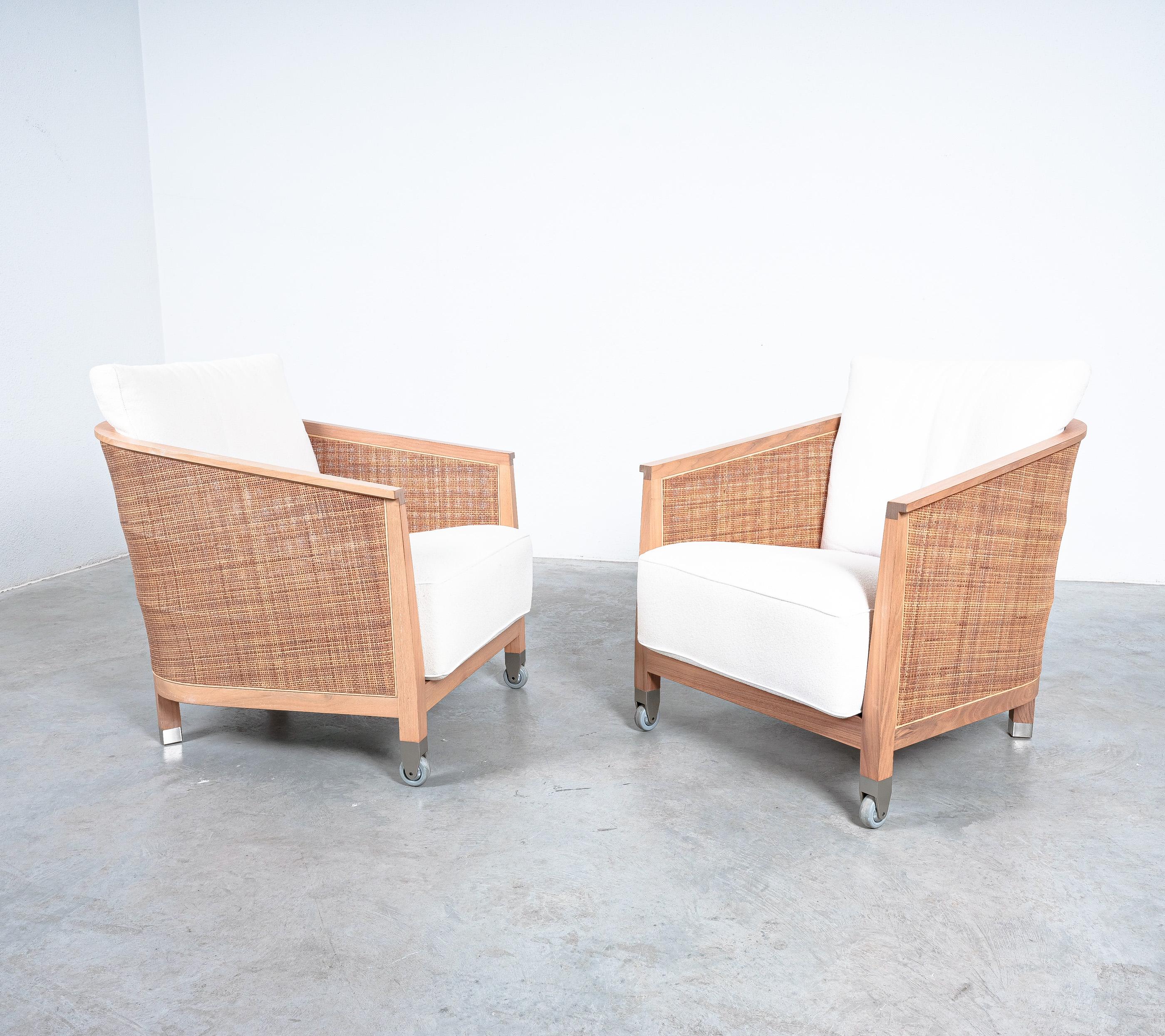 A pair of Mozart chairs by Flexform, Italy 1996- Priced as a pair

Great comfort chairs from solid ash-wood and canaletto - work (rush netting).
It's from outstanding quality with a certain outdoor charm and certainly to be used outdoors as well.