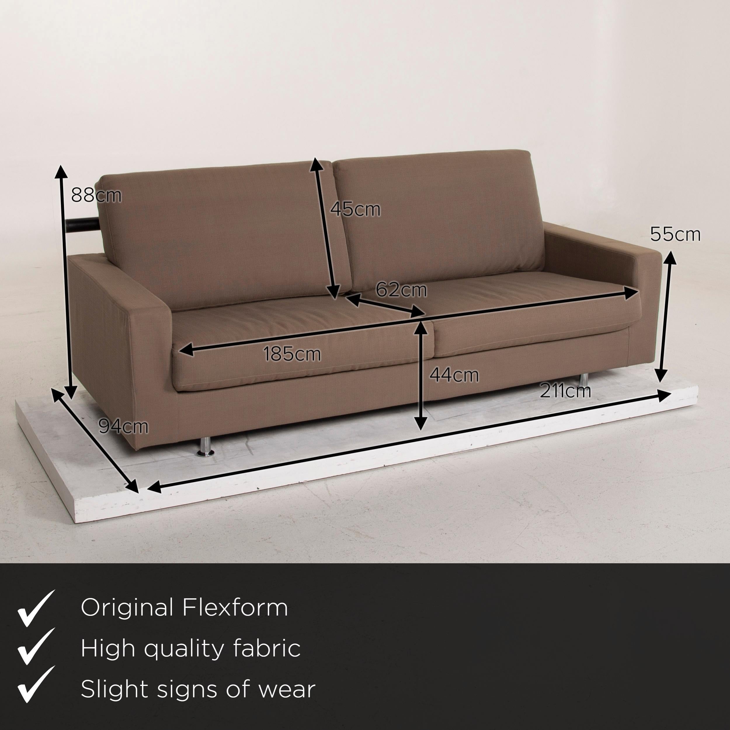 We present to you a Flexform fabric sofa beige two-seat.
   
 

 Product measurements in centimeters:
 

Depth: 94
Width 211
Height 88
Seat height 44
Rest height 55
Seat depth 62
Seat width 185
Back height 45.