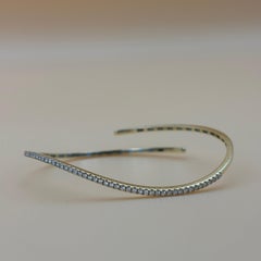 Flexibler Armreif aus 18k Gelbgold mit 0,65 TCW Diamant