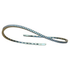 Flexibler Armreif aus 18k Gelbgold mit 0,65 TCW Diamant