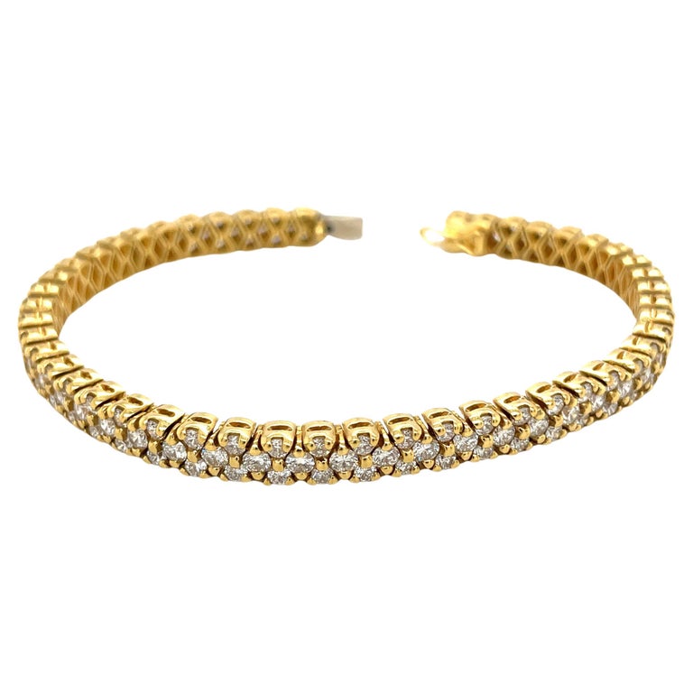 Flexible 18 Karat Yellow Gold and Diamond Tennis Bracelet For Sale at