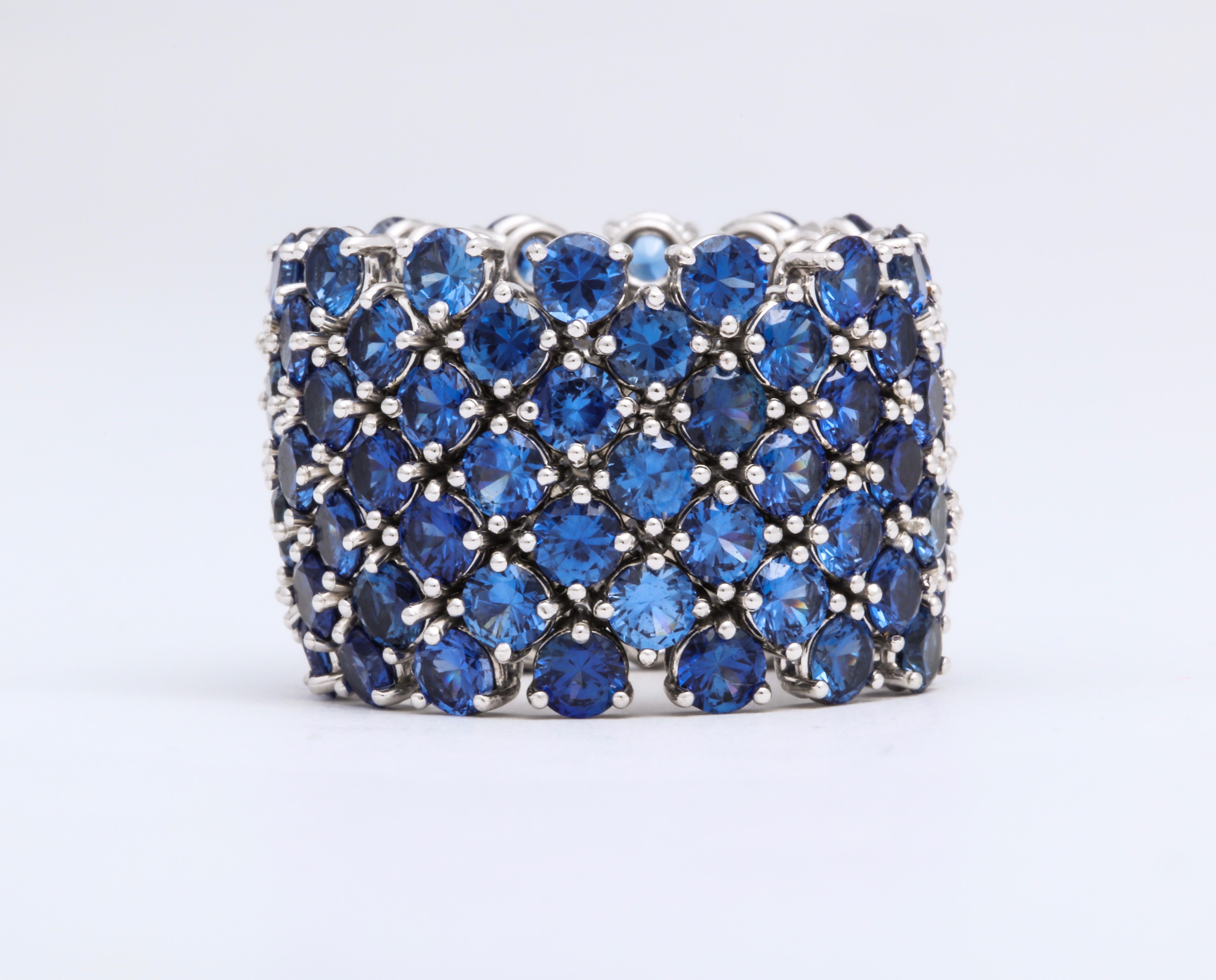 Flexible 7-Row Blue Sapphire White Gold Ring In New Condition For Sale In Bal Harbour, FL