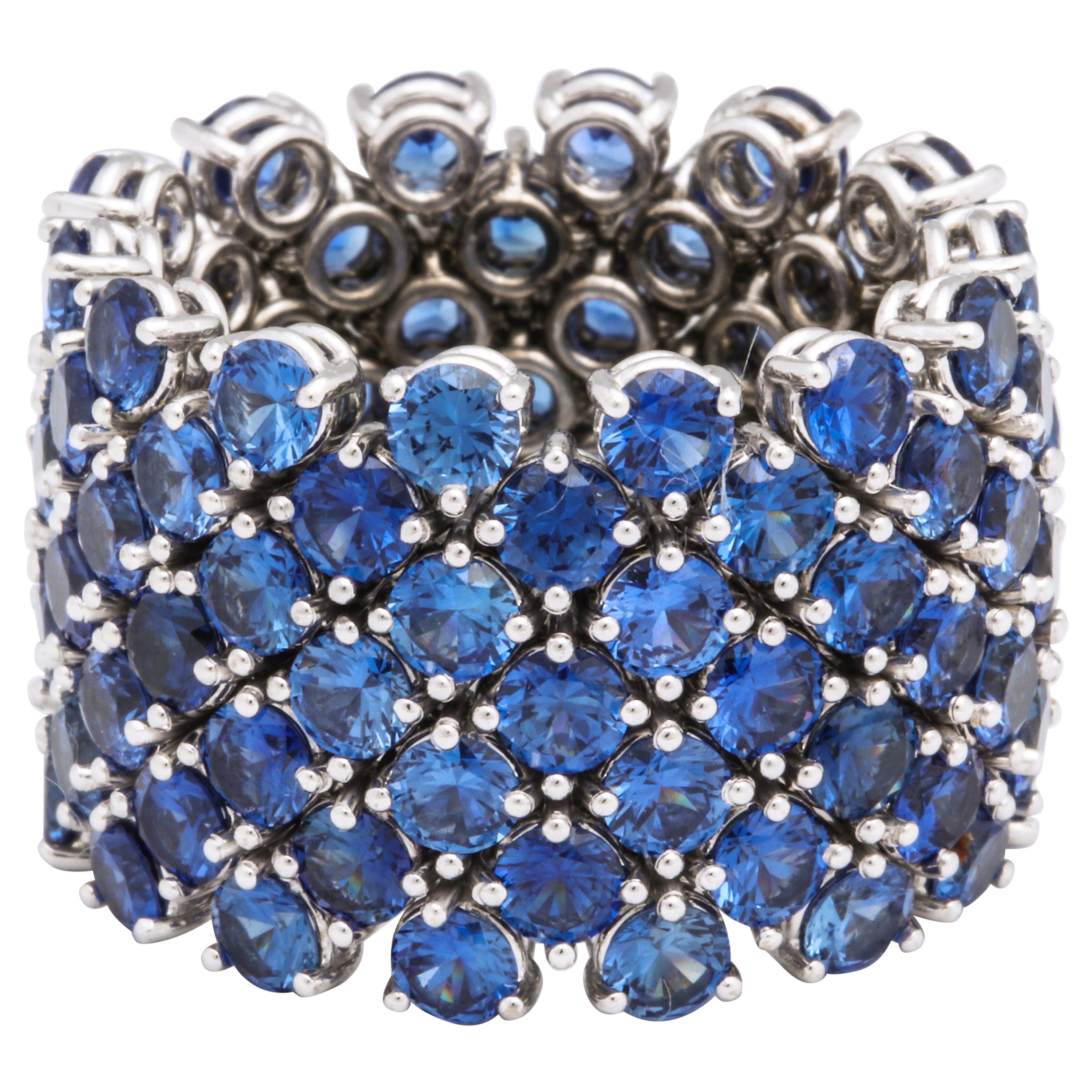 Flexible 7-Row Blue Sapphire White Gold Ring For Sale