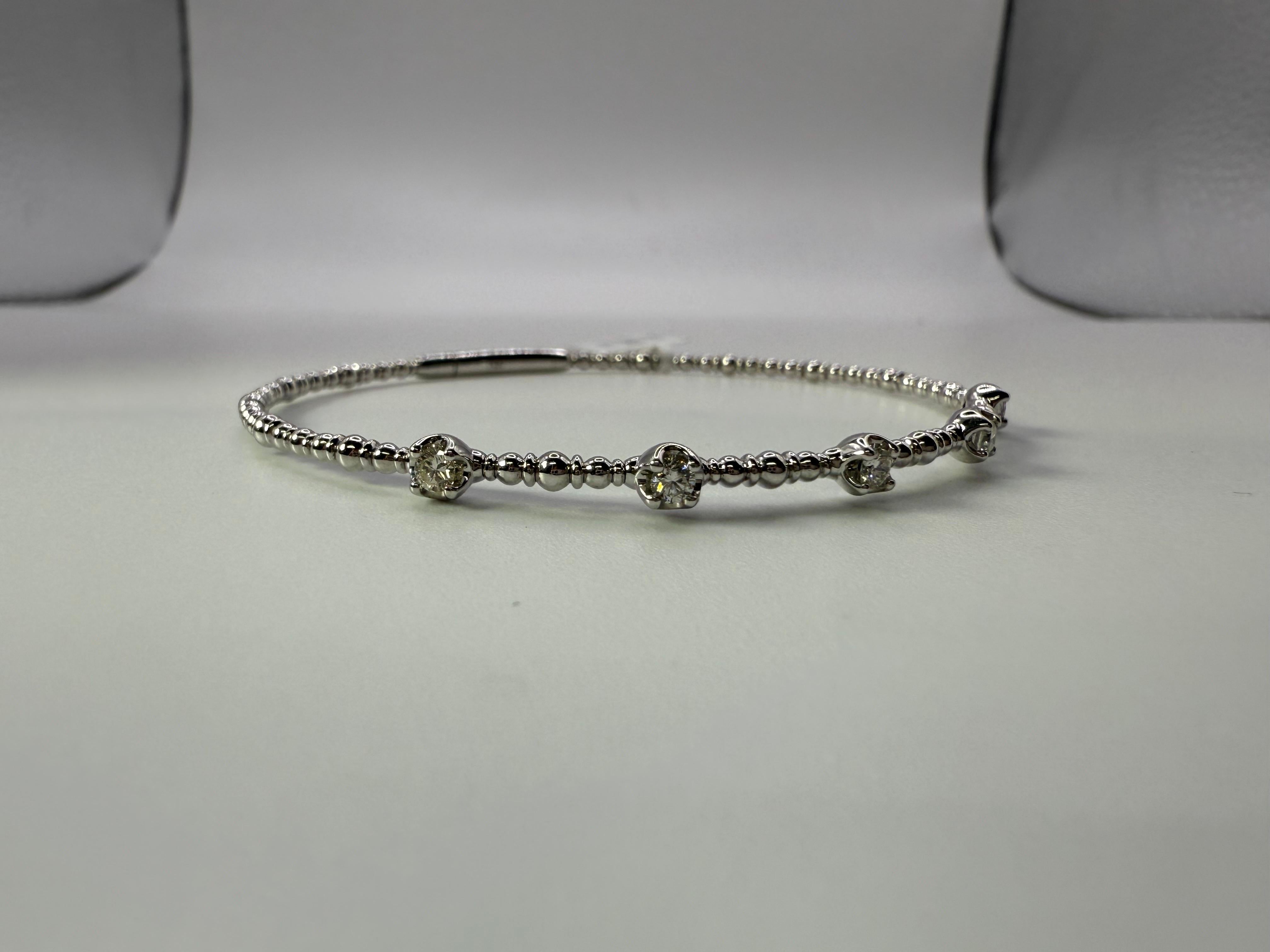 0.32ct of diamonds made in 14KT white gold flexible bracelet, stunning and very comfortable on any wrist. Just over 5 grams.

WHAT YOU GET AT STAMPAR JEWELERS:
Stampar Jewelers, located in the heart of Jupiter, Florida, is a custom jewelry store and