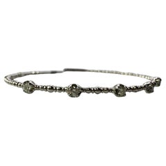 Flexible Diamond bracelet fits most wrists 14KT gold