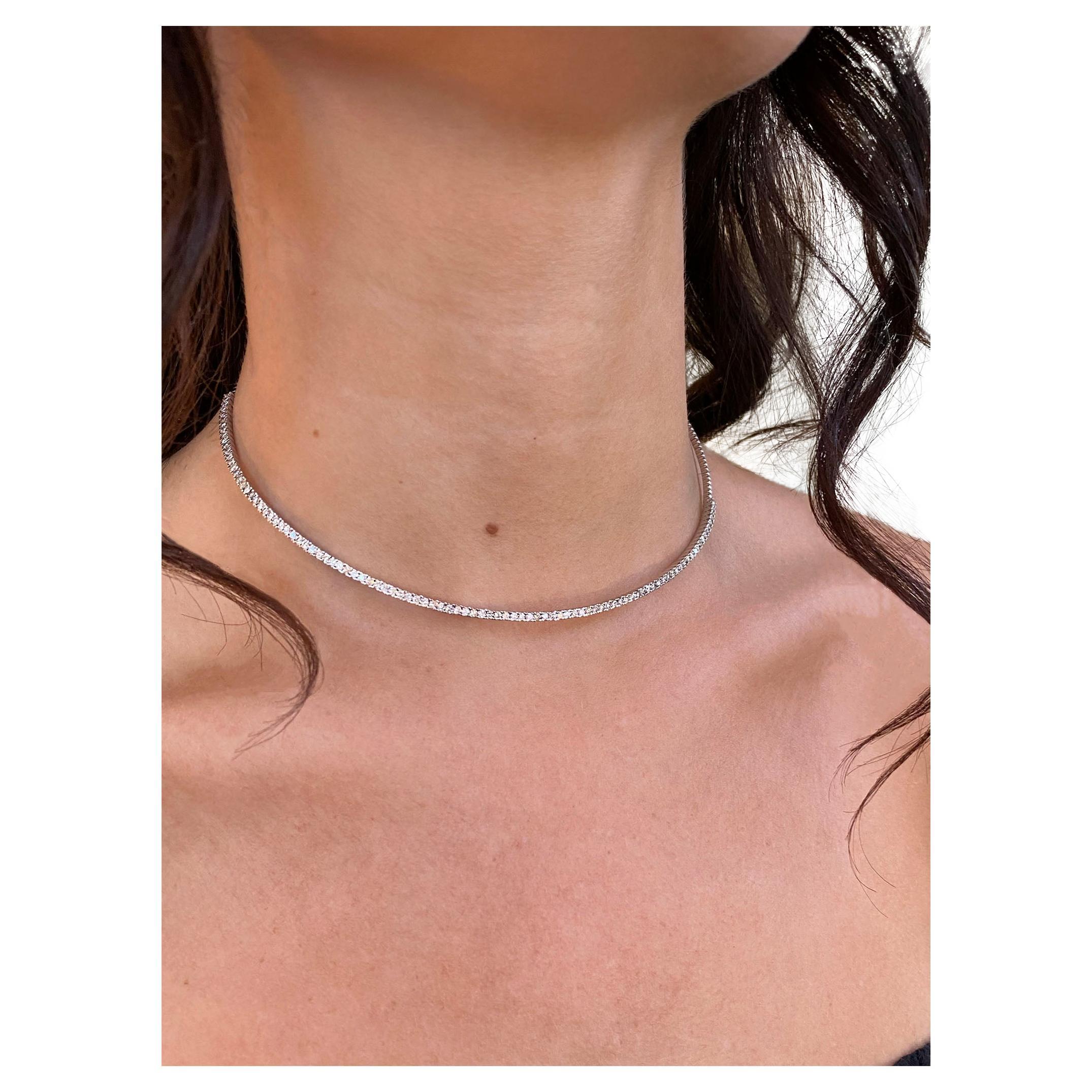 The diamonds are always face-up on this flexible diamond collar. It is a fun and modern take on a traditional tennis necklace with its smart and sexy design. 

All of the carat weight is in the front half of the necklace. Diamonds are meant to be