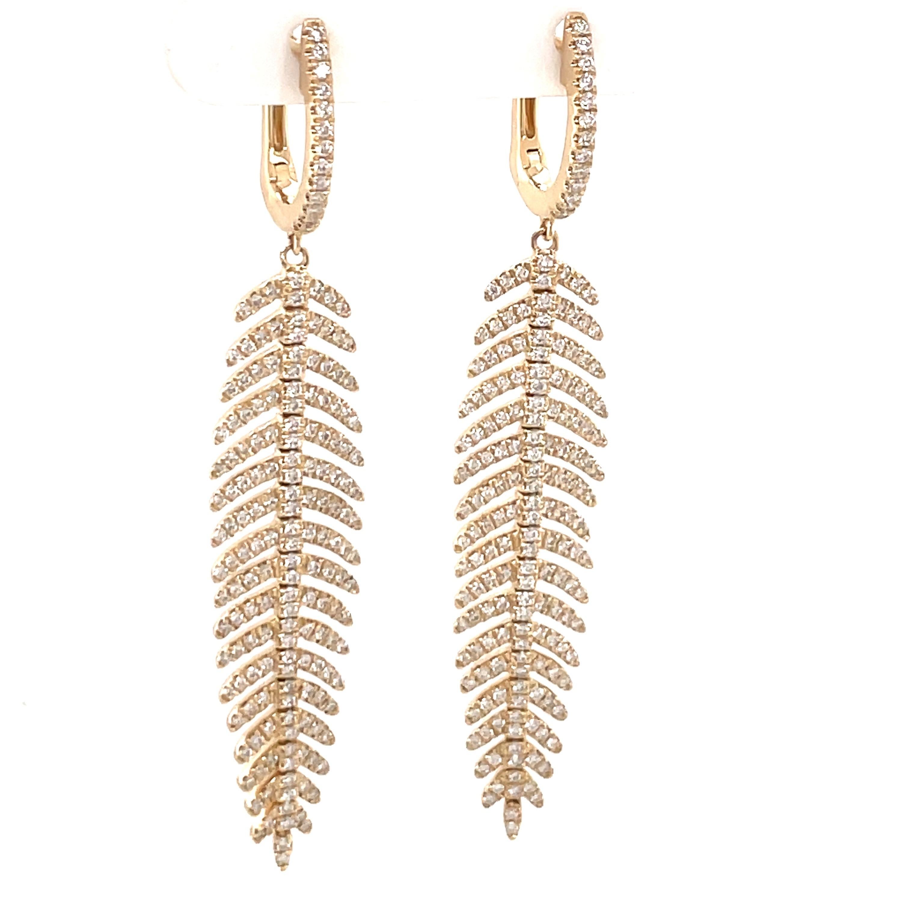 14 Karat Yellow gold drop earrings featuring 358 round brilliants in a feather motif weighing 1.28 carats.
Color G-H
Clarity SI

Available in white gold. 