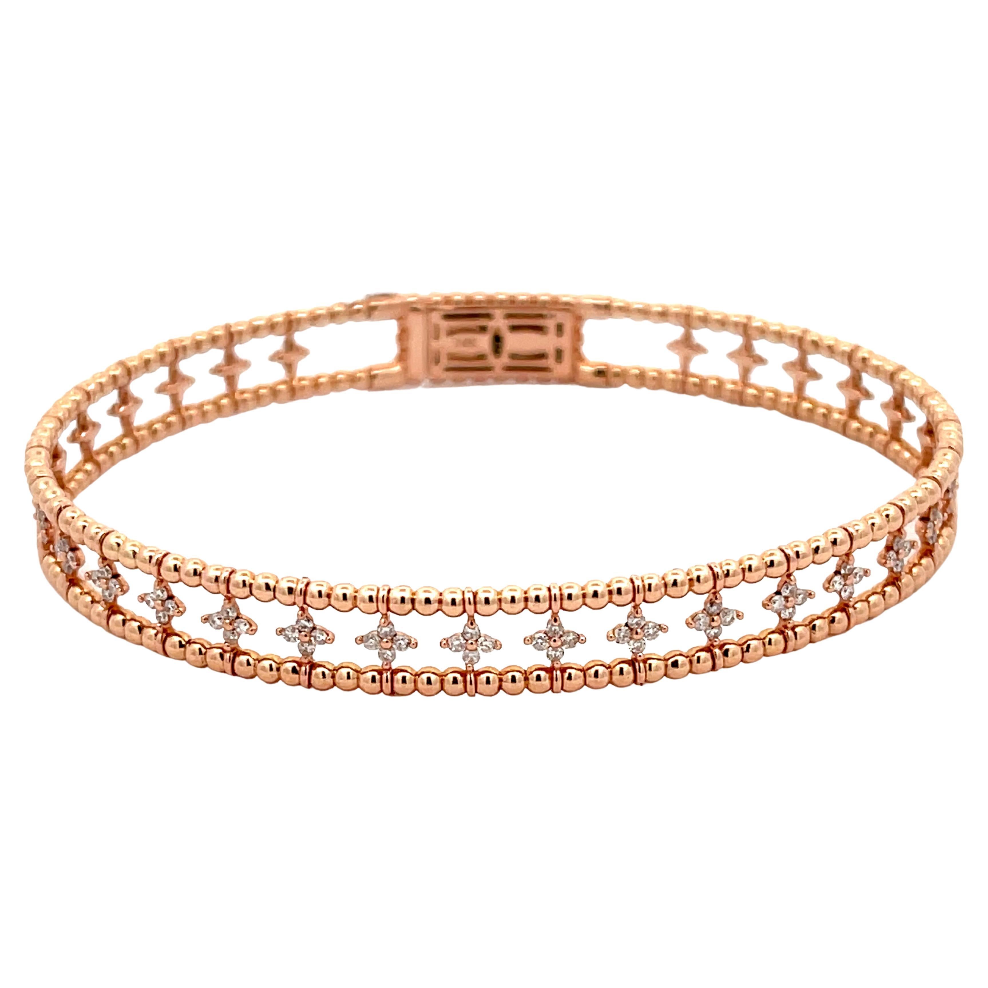 Bracelet souple à motif de fleurs en or rose 14 carats et diamants en vente
