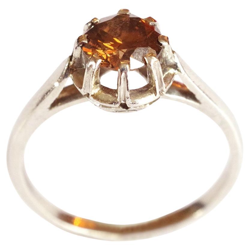 Certified 0.79 ct fancy deep brown slightly orange diamond, platinum ring For Sale