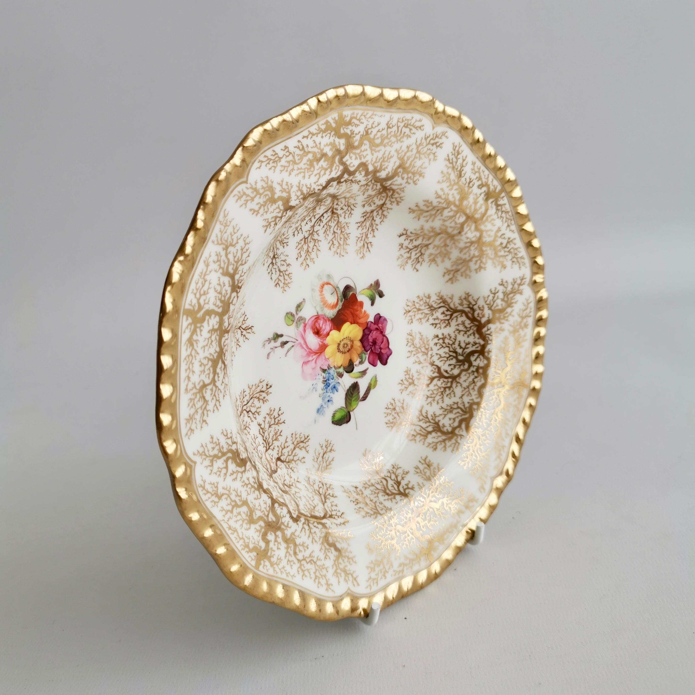 This is a beautiful small bowl made by Flight, Barr & Barr between 1816 and 1820. The bowl is decorated with the characteristic gilt seaweed pattern.

It is a mystery what this bowl was for; it is an unusual size. If bigger, you could say it's a