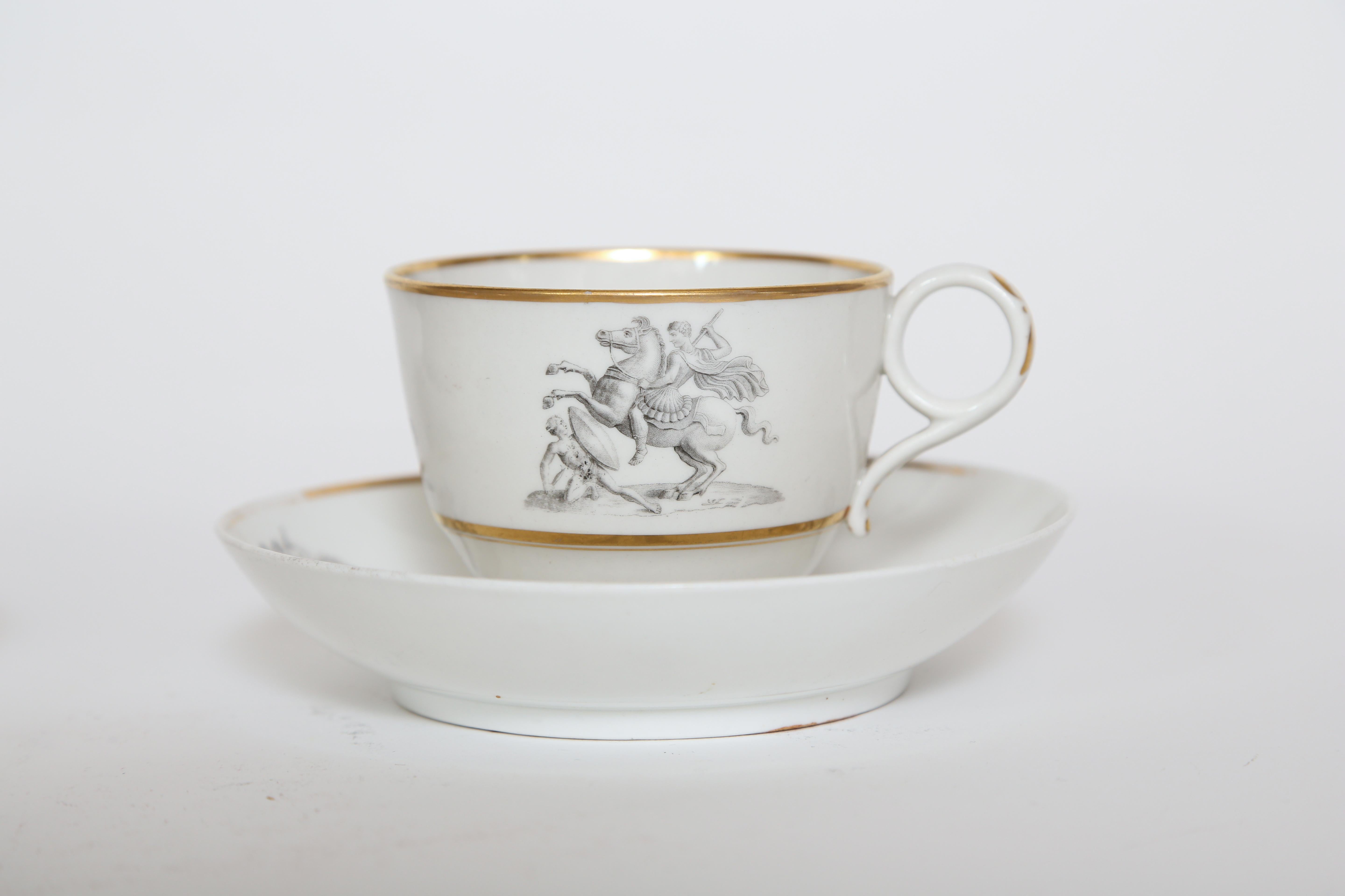 Set of six early 19th century flight, Barr & Barr cups and saucers. They are transfer printed in black with gilt edging. Applied finger ring with gold decoration. Marked on the underside BFB with a crown above. There is some wear to the gold and