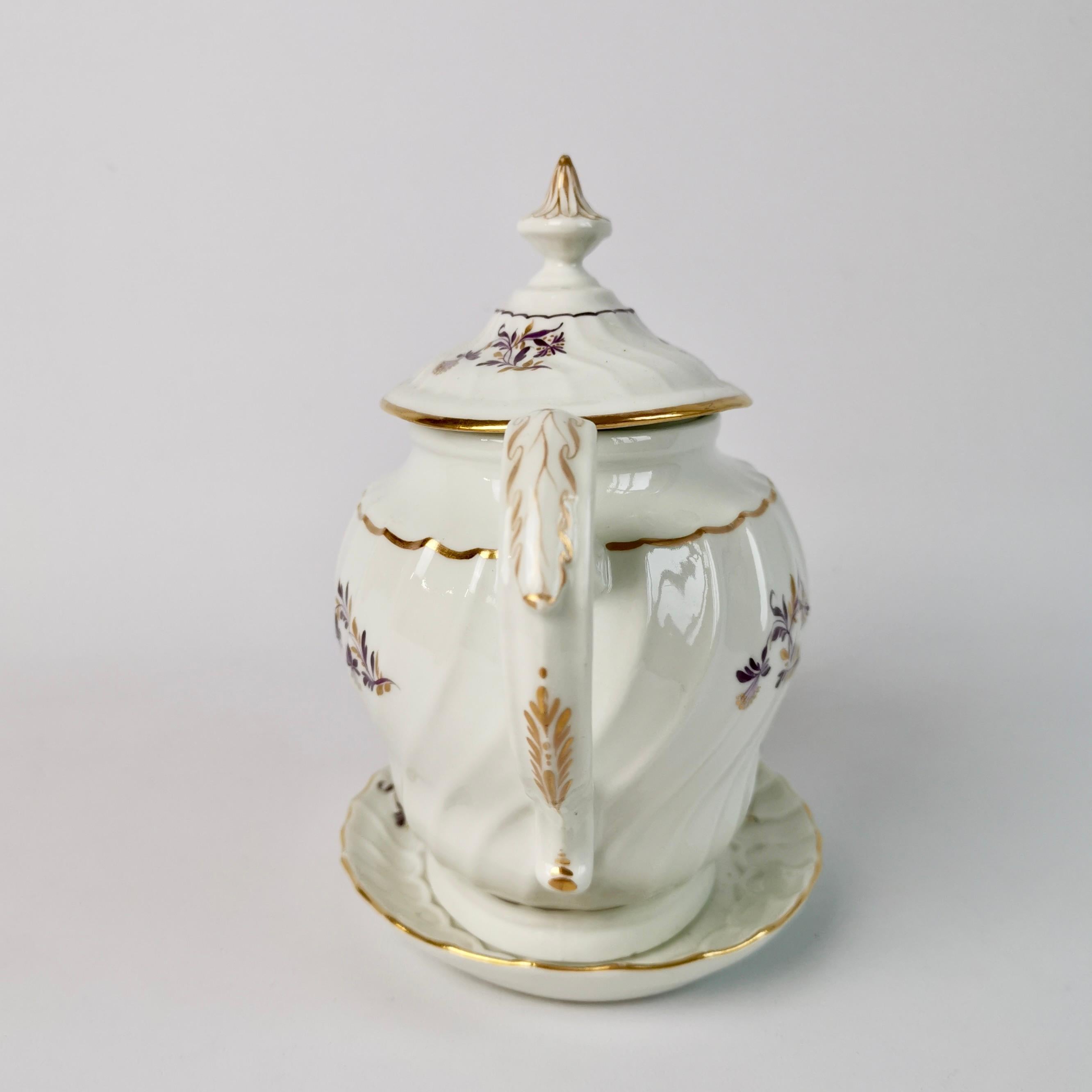 This is a beautiful teapot on a stand, made by Flight & Barr in or shortly after 1792. The items are in the 