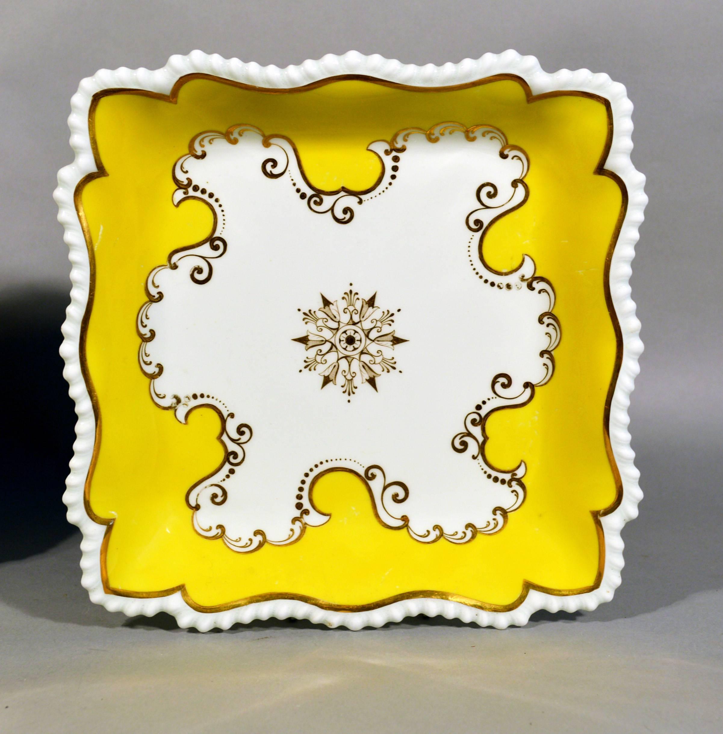 Flight, Barr & Barr Worcester yellow ground square porcelain dishes,
circa 1820.

The square porcelain dishes with an impressed FBB mark have a shaped, crimped border with a thin gilt band encircling the dish. The centre has a painted gilt star
