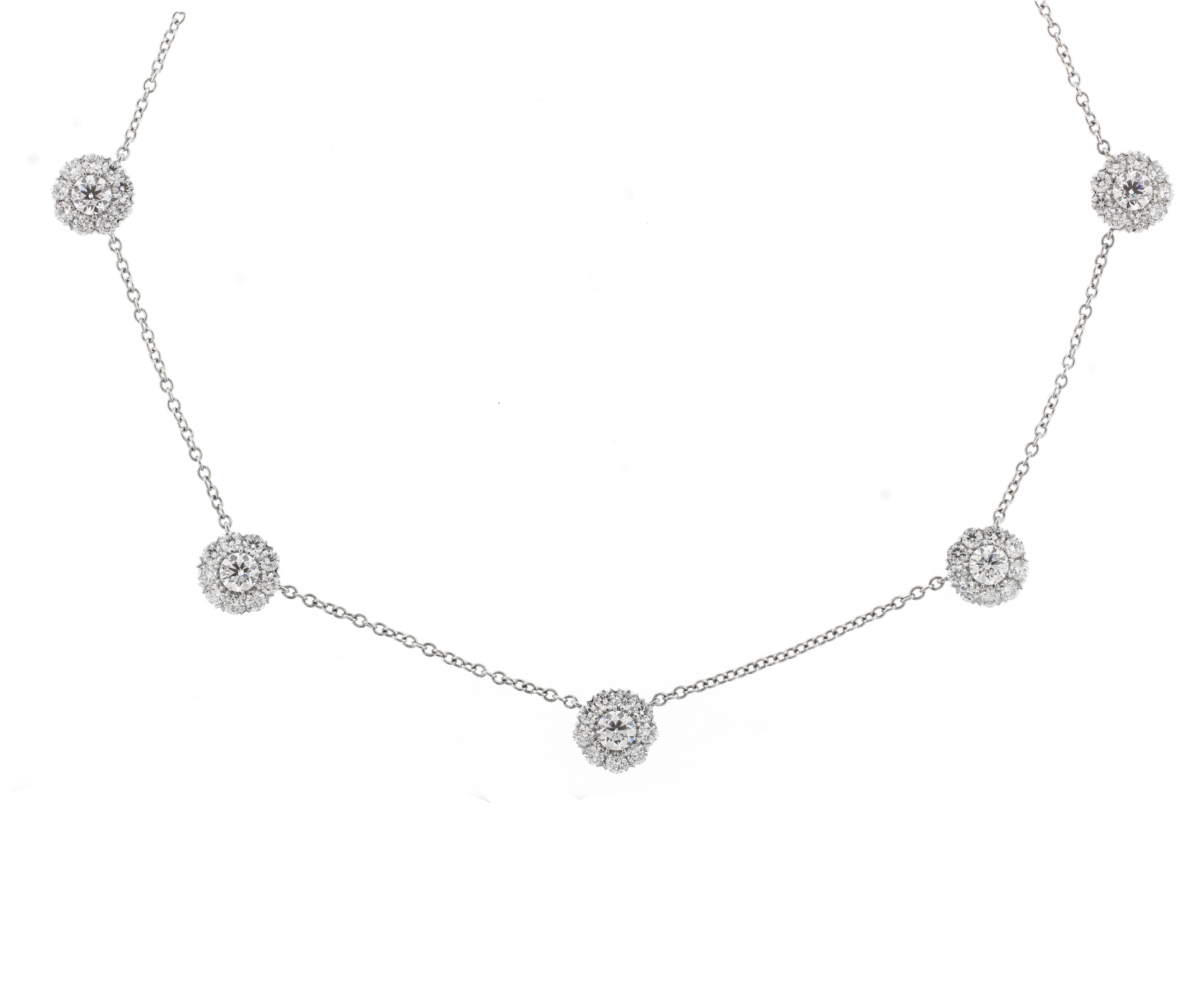 From the master Jewelers of Pampillonia, our fiore five station diamond necklace. The fiore motif is taken directly from the original Van Cleef & Arples models.  Pampillonia acquired the molds and from models from the estate Robert Barre a former