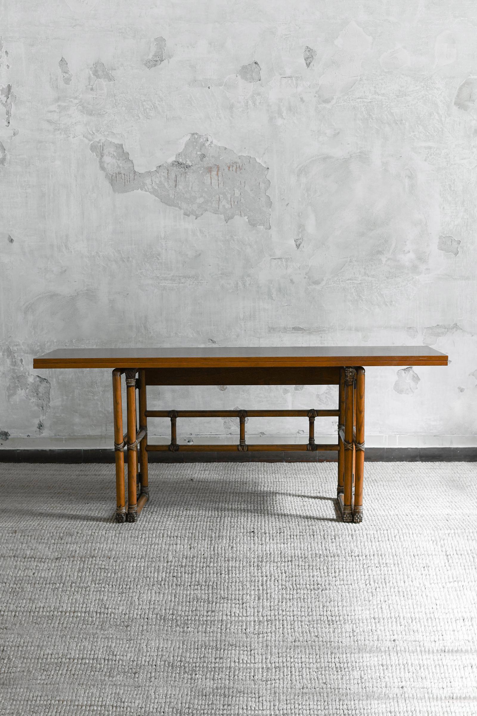 Flip-top console table, McGuire San Francisco 1970
Product Details
Made of bamboo with leather bindings and a wooden top.
Dimensions with top open: 183 W x 73.5 H x 90 D cm
Dimensions with top closed: 183 W x 73.5 H x 45 D cm
