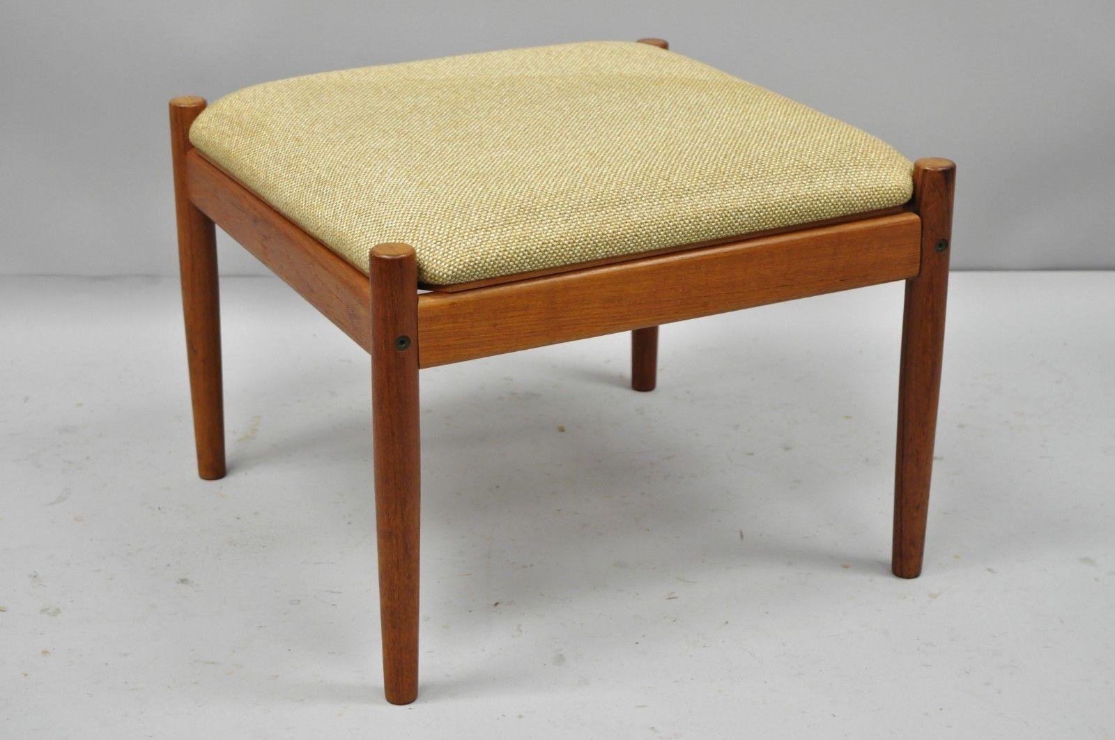 Flip-top midcentury Danish modern convertible teak side table, stool or ottoman. Item features convertible flip top which changes from a side table to an upholstered stool, stamped 