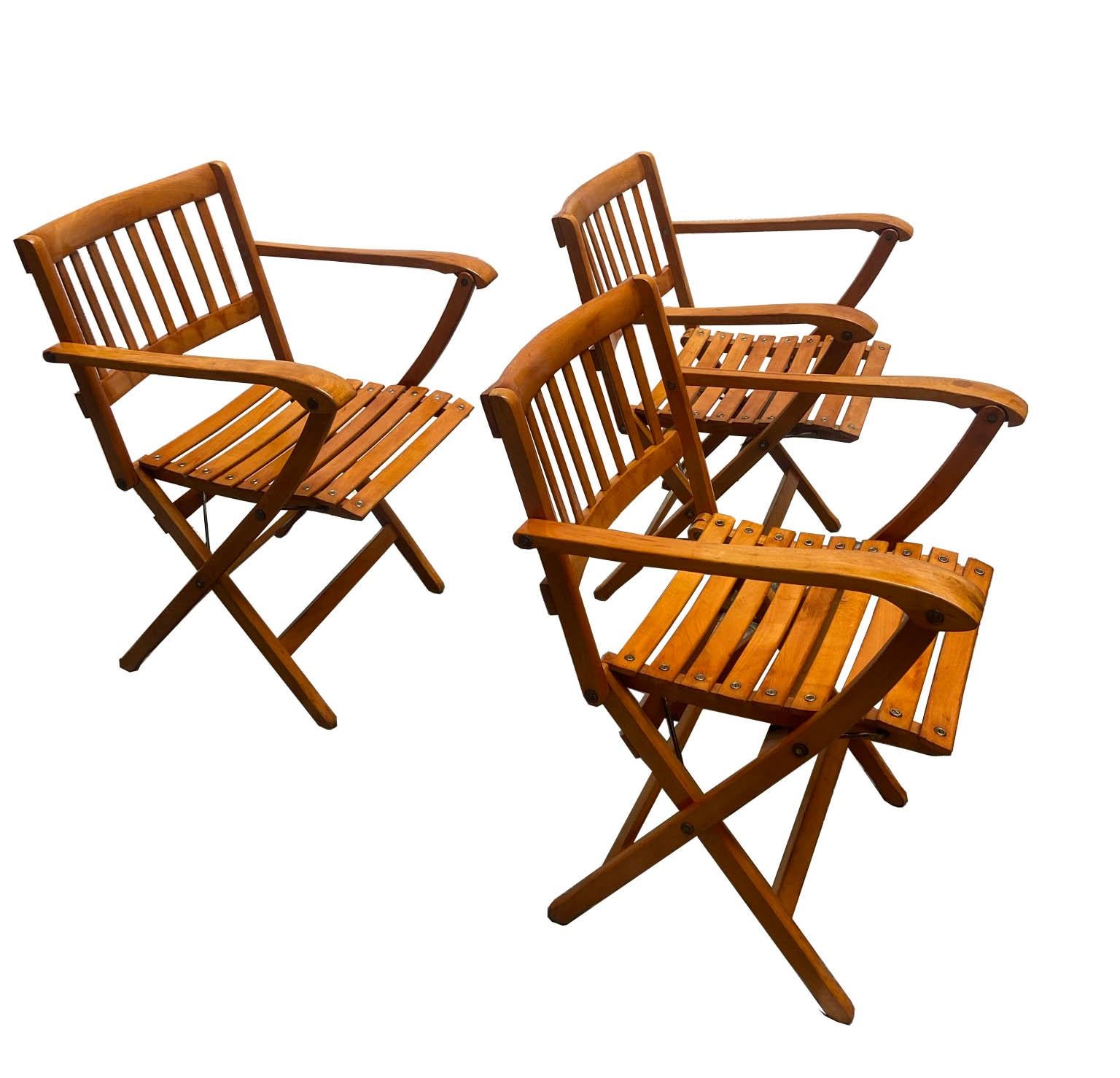 Group of three beautiful garden chairs with armrests, folding, produced by Fratelli Reguitti, Italy, 1970. The chairs are branded and in beech wood.