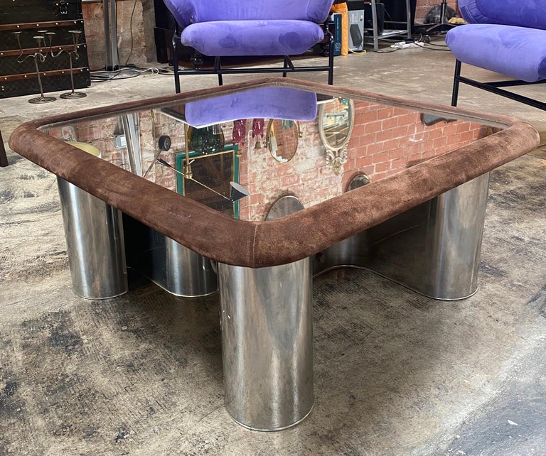 Midcentury Italian made round dining table attributed to Gianfranco Frattini. The table has a square chrome top. The table is in excellent condition, has very light scratches.