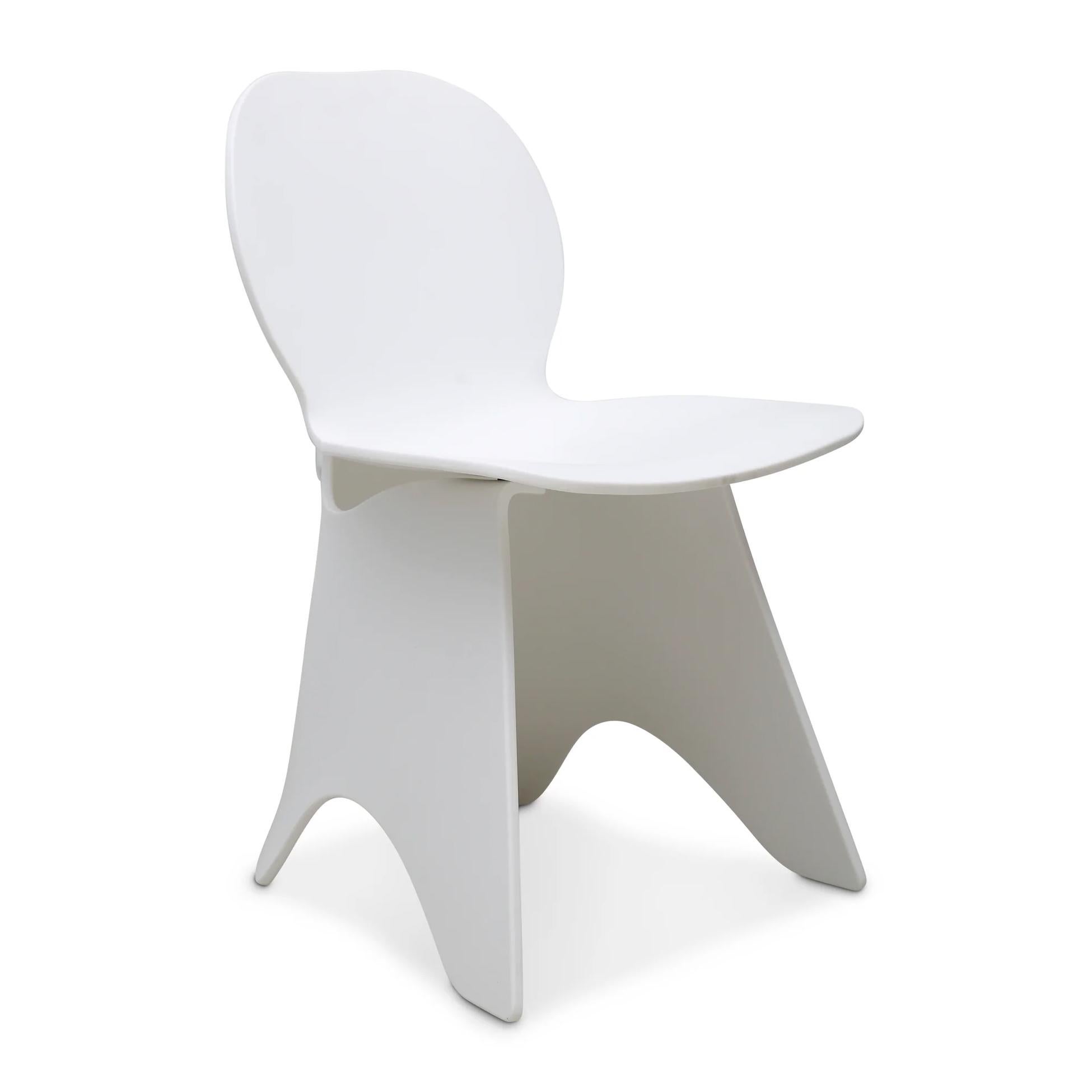 Flo chair is made of thermoformed Corian, a durable countertop material with a stone-like feel. The folds and curves create a structural base and comfortable seat, giving the piece an engaging, sculptural quality. This piece is suitable for interior