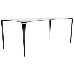 FLO - Metal dining room table with stiletto legs and custom finishes