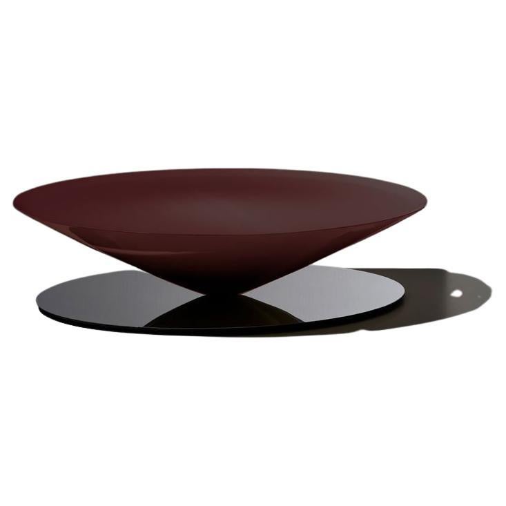 Table basse flottante en acier poli avec miroir rouge brillant, conçue par La Chance