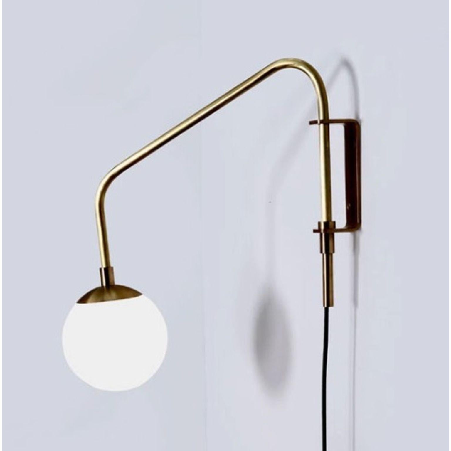 Float One Arm Glass Globe Wall Sconce by Lamp Shaper
Dimensions: D 79 x W 43 x H 38 cm.
Materials: Brass and glass.

Different finishes available: raw brass, aged brass, burnt brass and brushed brass Please contact us.

All our lamps can be wired
