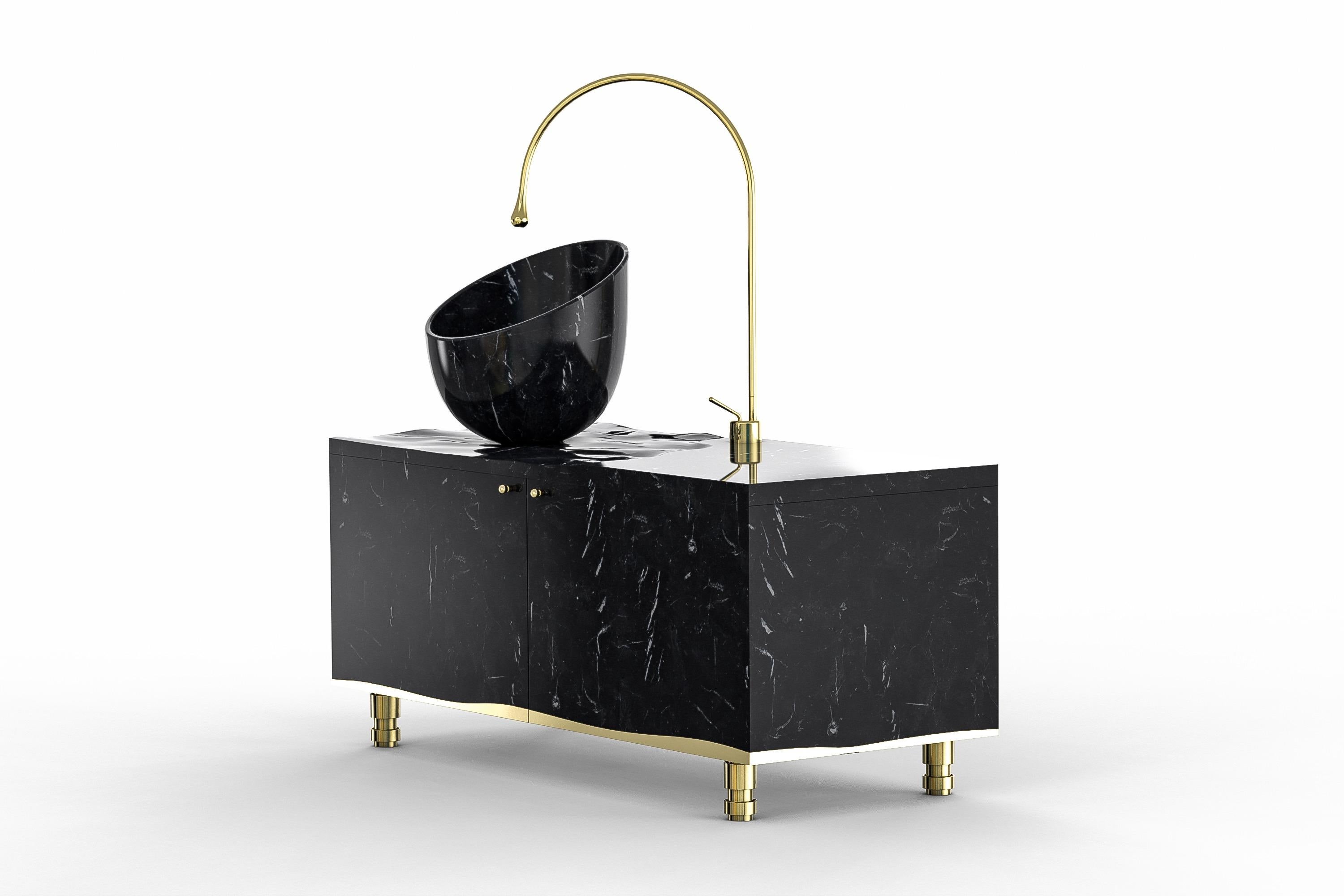 Float washbasin and cabinet by Marmi Serafini.
Materials: Nero Marquina marble, brass.
Dimensions: D 50 x W 120 x H 88 cm
Available in other marbles.

Cabinet made to be in a synergy with the surrounding water elements and the bathroom environment.