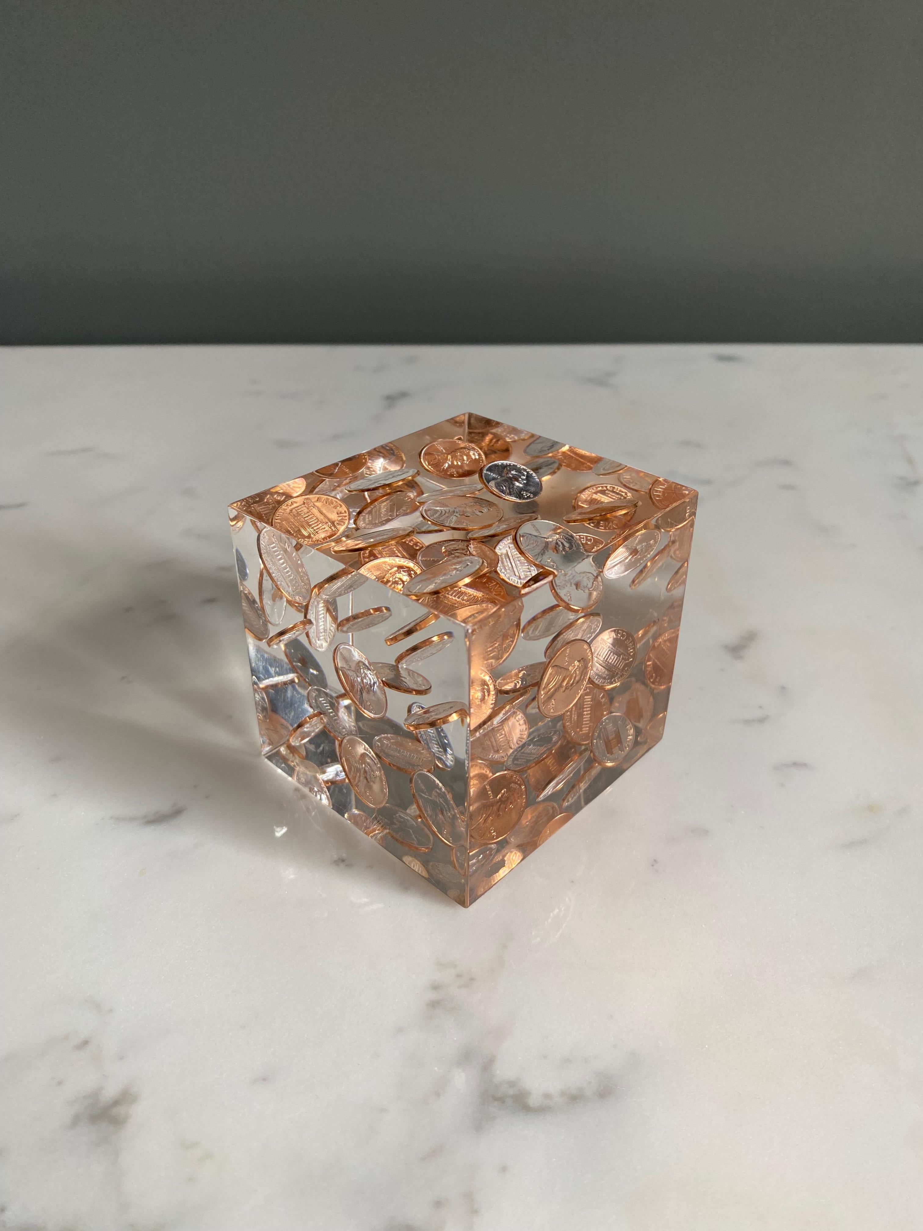 Floating 1970's Pennies in Lucite cube paperweight / sculpture.