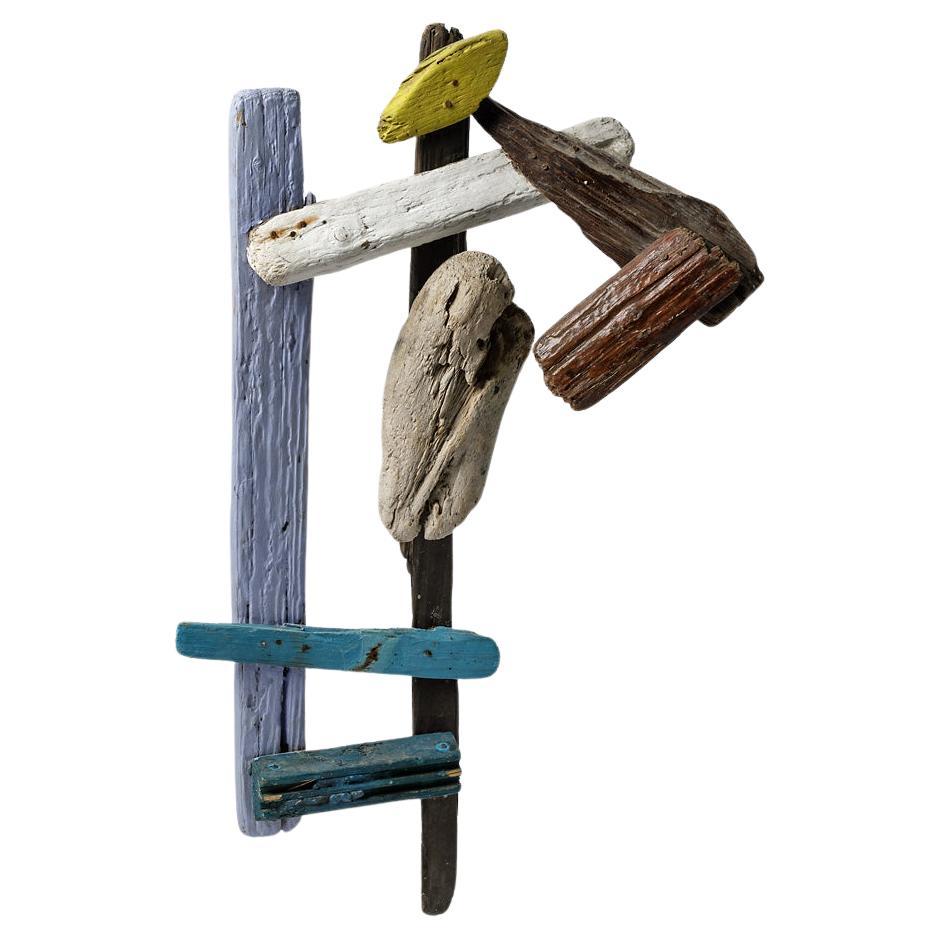 Floating and painted wood composition by Michel Lanos.  Circa 1980-1990. For Sale