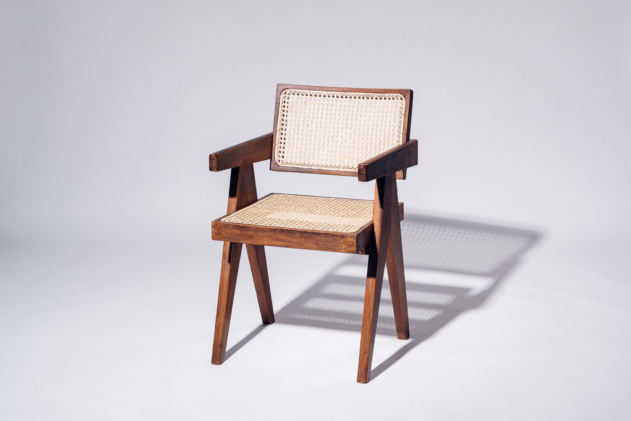 An authentic mid-century piece from Pierre Jeanneret’s legendary Chandigarh commission. Teak frame with hand-woven bamboo-rattan seat & back.