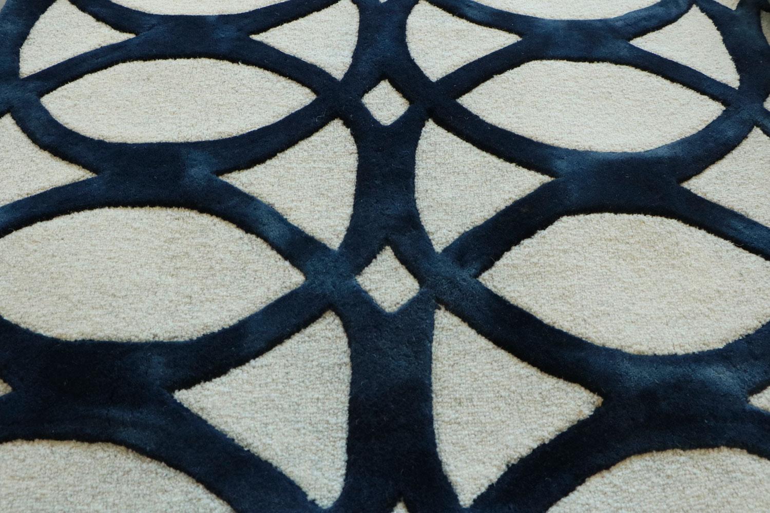 Floating blue by Italian contemporary rug company G.T.DESIGN is created through an updated tie and dye technique and produced in high quality New Zealand wool.
The geometrical pattern or interlocking circles, designed by G.T.DESIGN’s creative