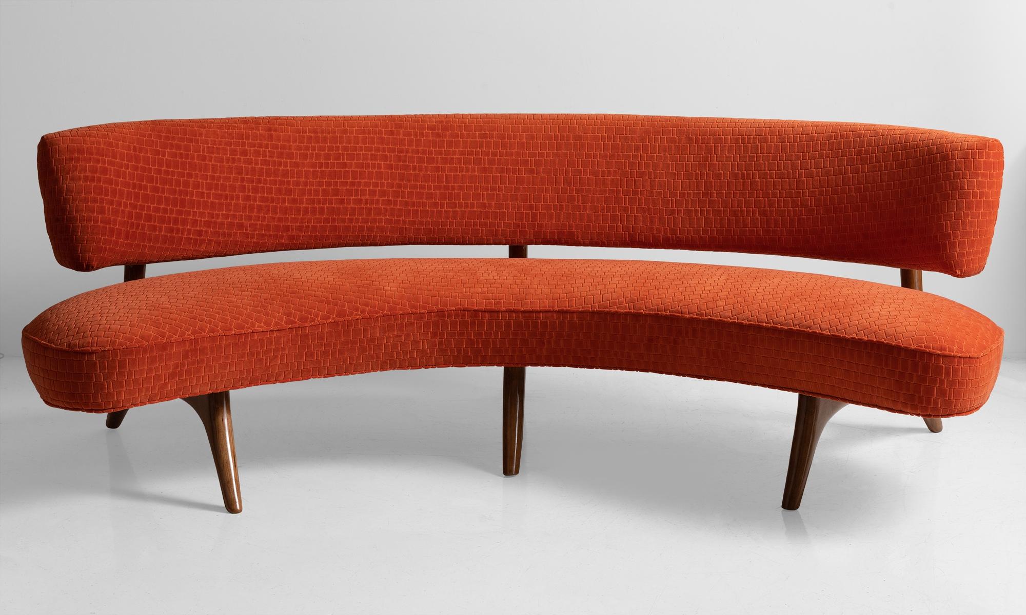 Model - 176SC sofa, originally designed in 1952. Textured orange velvet upholstery on cherry frame. Designer label present under seat.