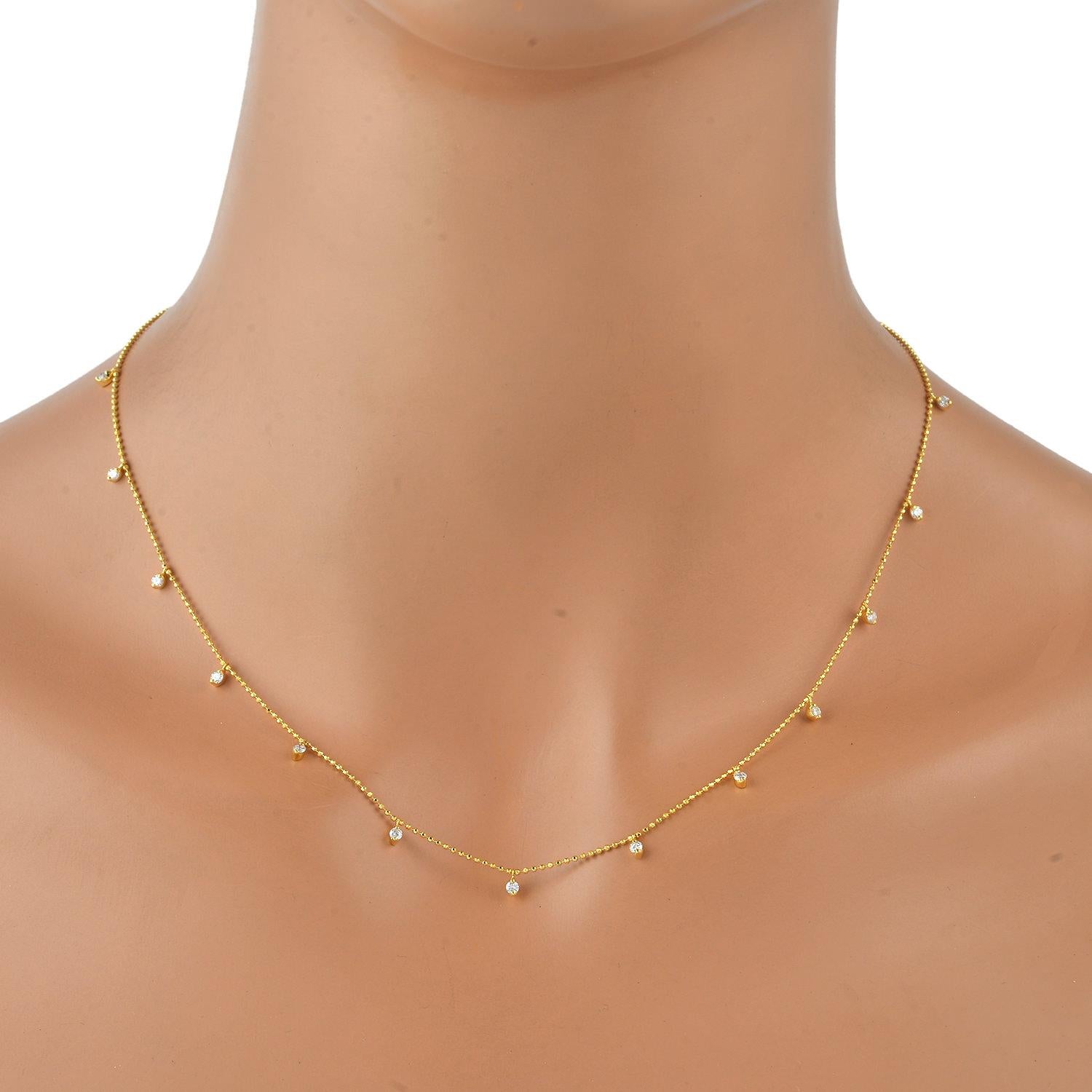 Cast from 18-karat gold, this floating necklace is hand set with .46 carats of sparkling diamonds on the 18