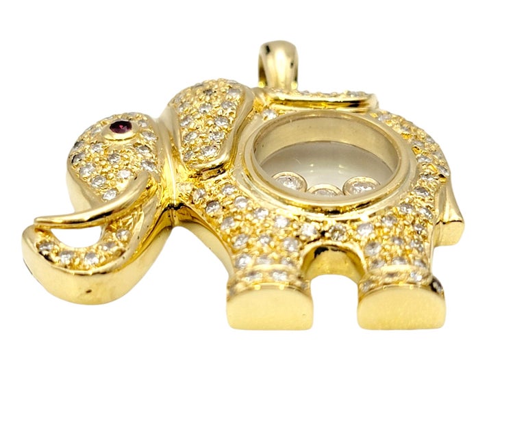 Round Cut Floating Diamond and Pave Elephant Pendant with Ruby Eye in 18 Karat Yellow Gold For Sale