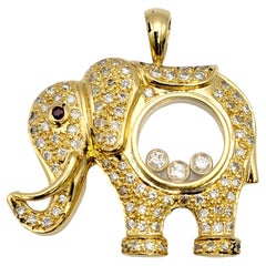 Floating Diamond and Pave Elephant Pendant with Ruby Eye in 18 Karat Yellow Gold