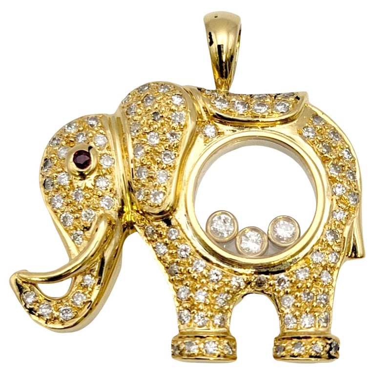 Floating Diamond and Pave Elephant Pendant with Ruby Eye in 18 Karat Yellow Gold For Sale