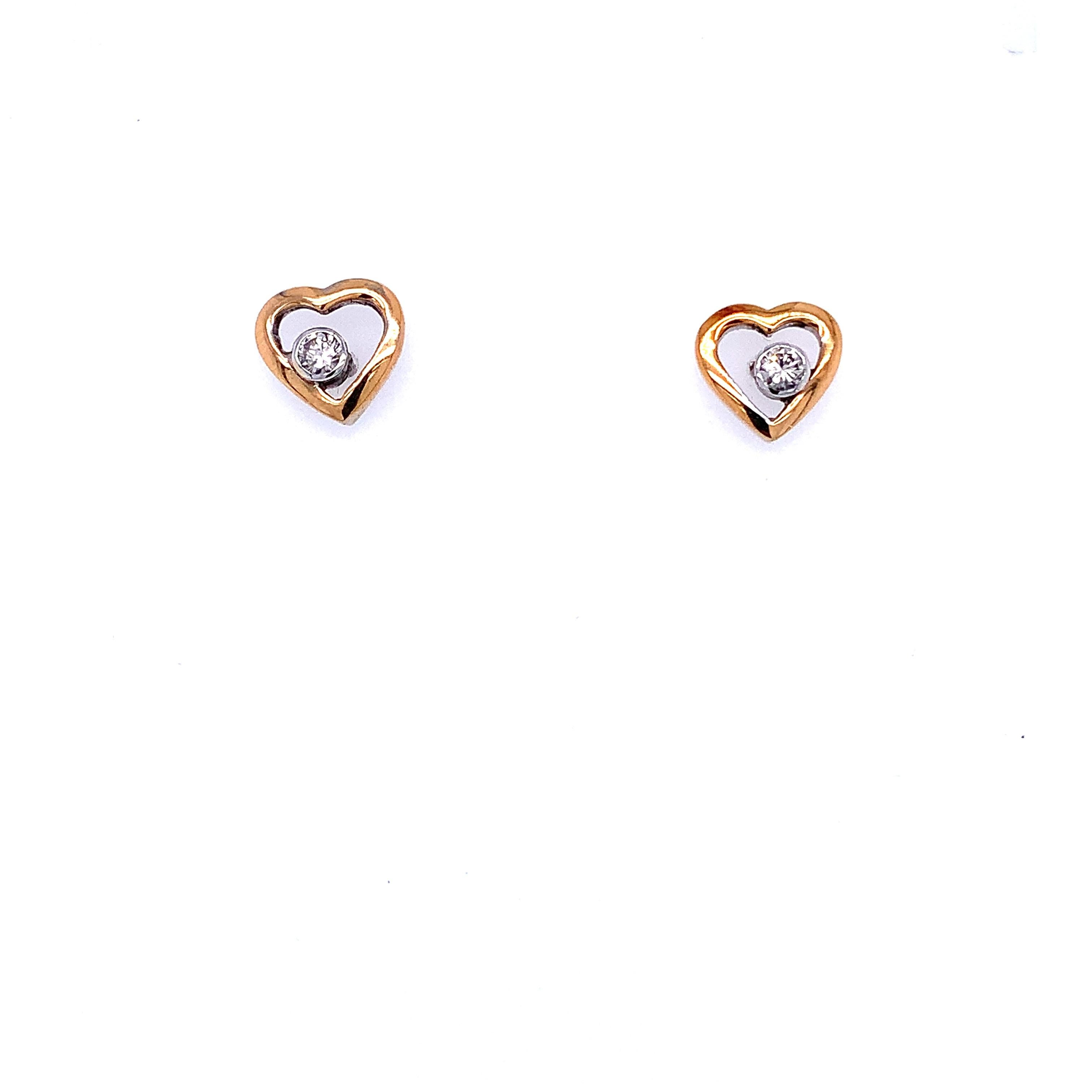Orecchini con diamanti fluttuanti a forma di cuore in oro rosa e bianco 18 carati in vendita 3