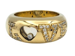 Floating Diamond Pavé LOVE Band Ring in 18 Karat Yellow Gold