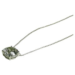 Floating Diamond Pendant in 18k White Gold by Maria Jose Jewelry