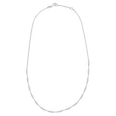 Collana Tennis con Trio di Diamanti Fluttuanti in Oro Bianco