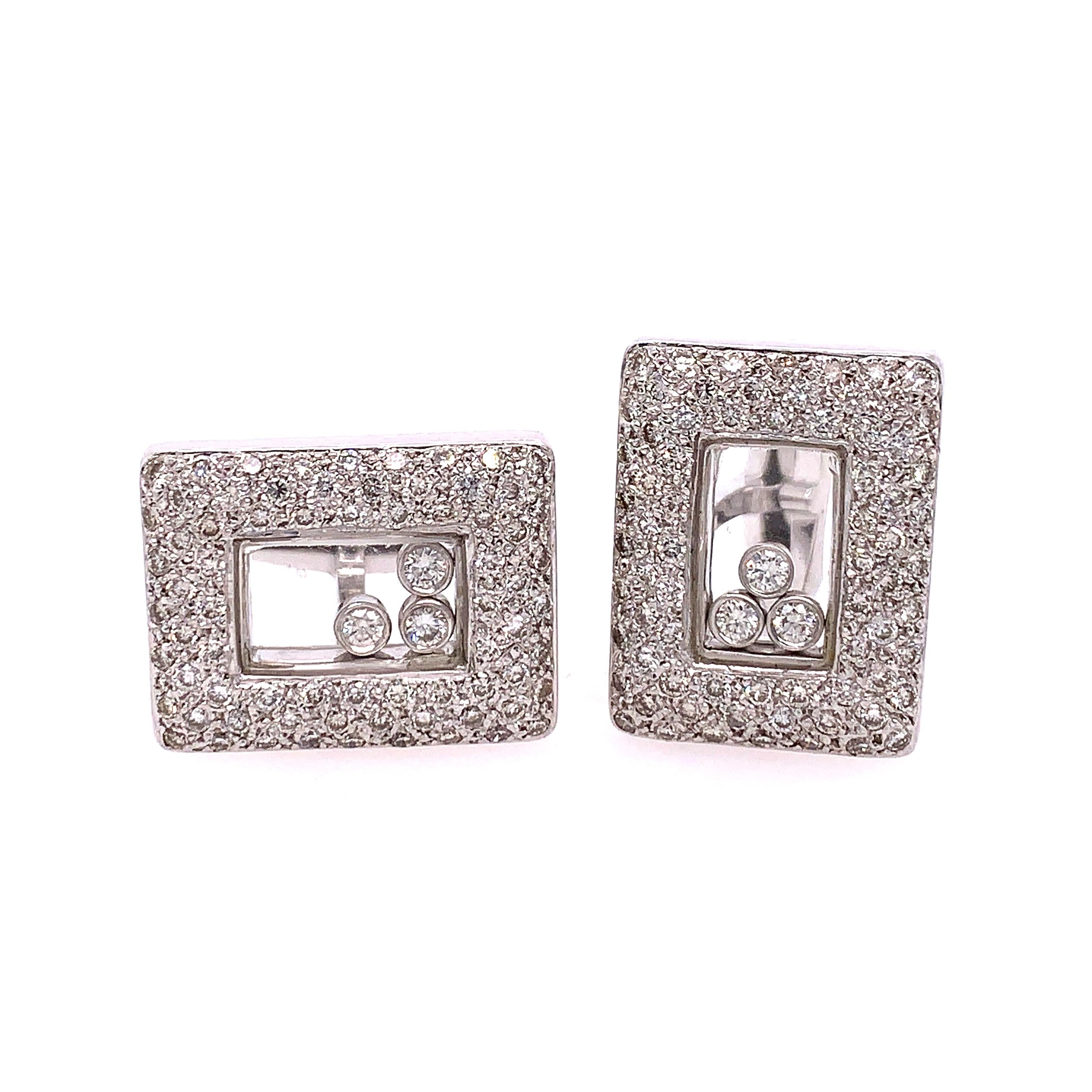 These fun and elegant Cufflinks contain approximately 1.55 Carats of diamonds as well as 3 floating diamonds in the center. set in 18k white gold.

The spectacular movement make a great conversational piece!
