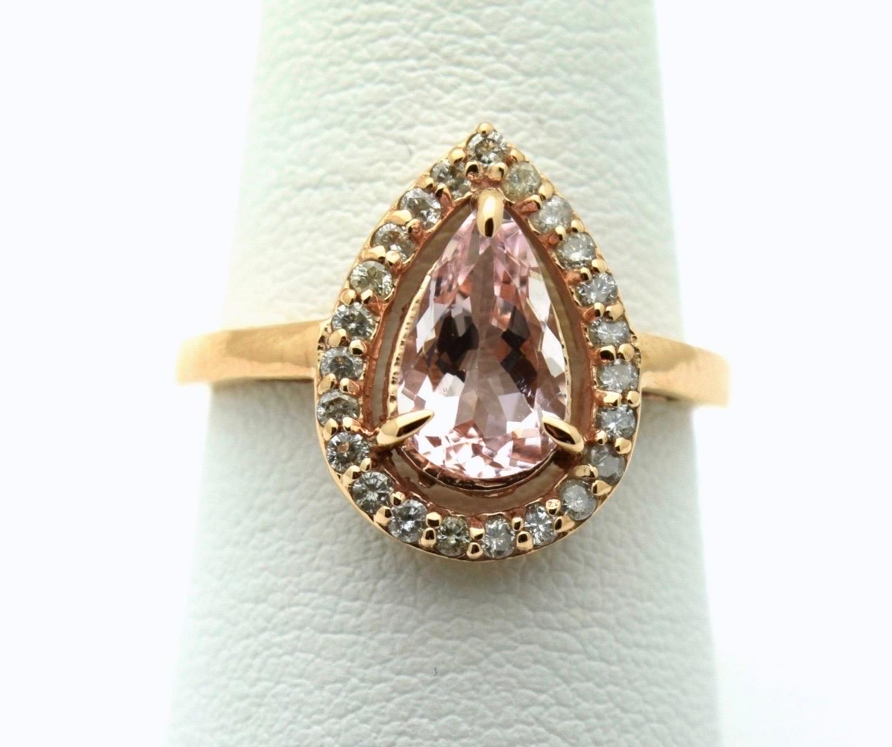 Floating morganite diamond ring in 18 karat rose gold, the ring is classical with a touch of modern. Diamonds are totalling 0.28 carats VS-SI clarity and F-G color, morganite is 8x6mm pink color.

Certificate of authenticity comes with