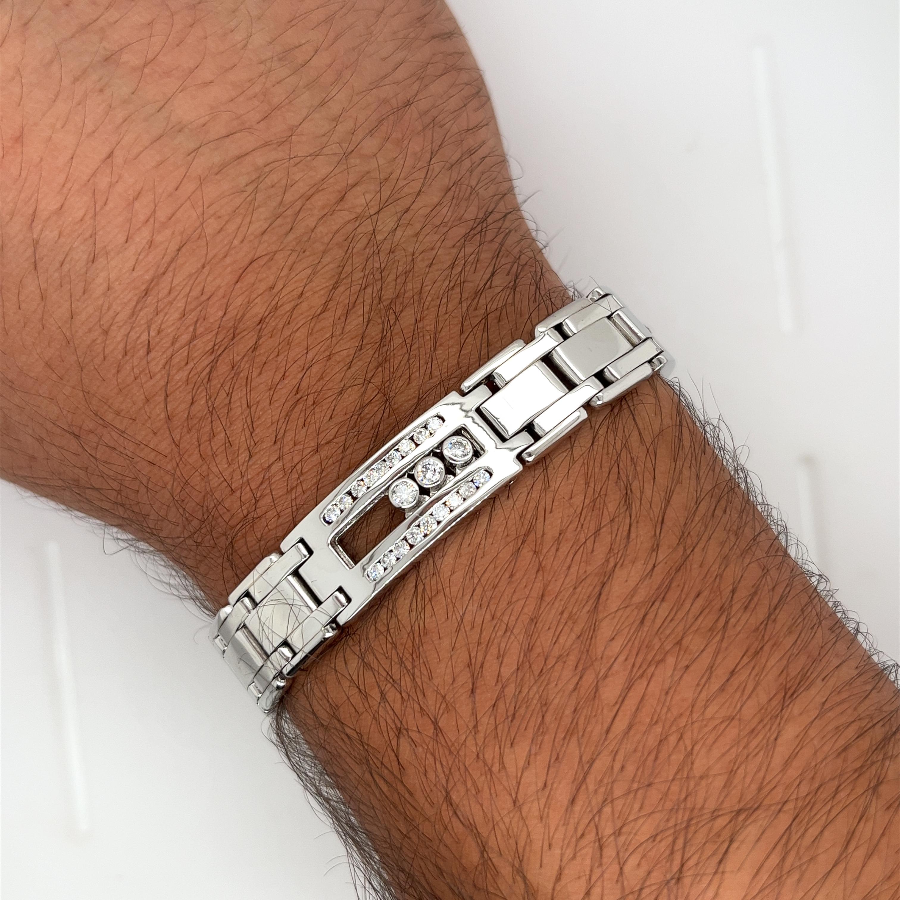 Get the bracelet that no one has. 

This unique bracelet features movable diamonds that glide along the channel set interior. An extraordinary make with eye-clean round cut diamonds. Set in 14 karat solid white gold and box/clip closure. 

12 bezel