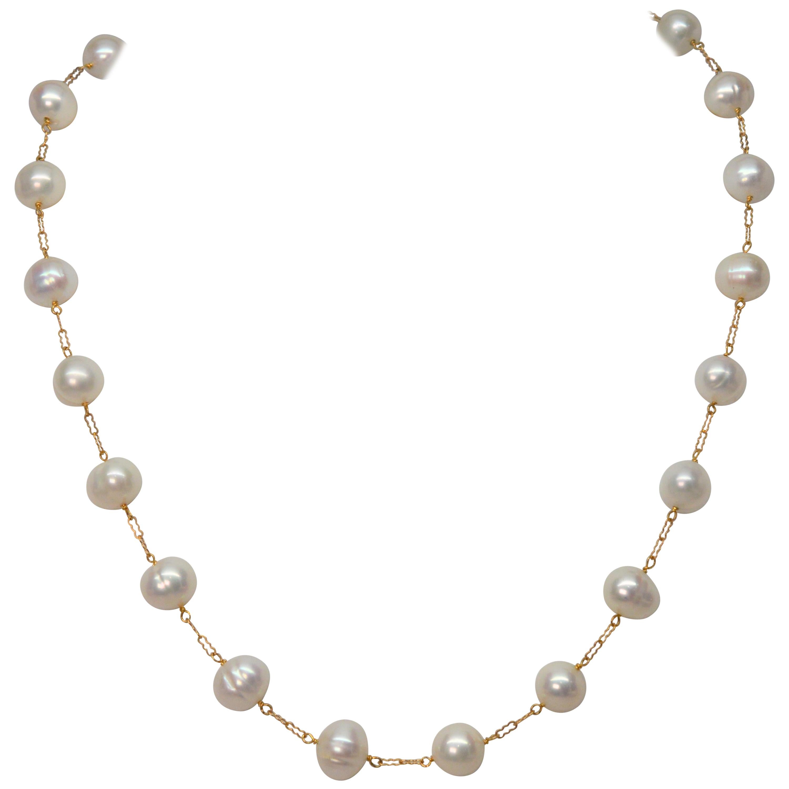 Floating Natural Ringed Pearl 14 Karat Yellow Gold Chain Necklace