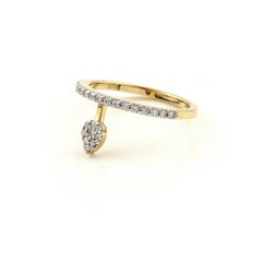 Bague empilable en or jaune et diamants en forme de poire flottante