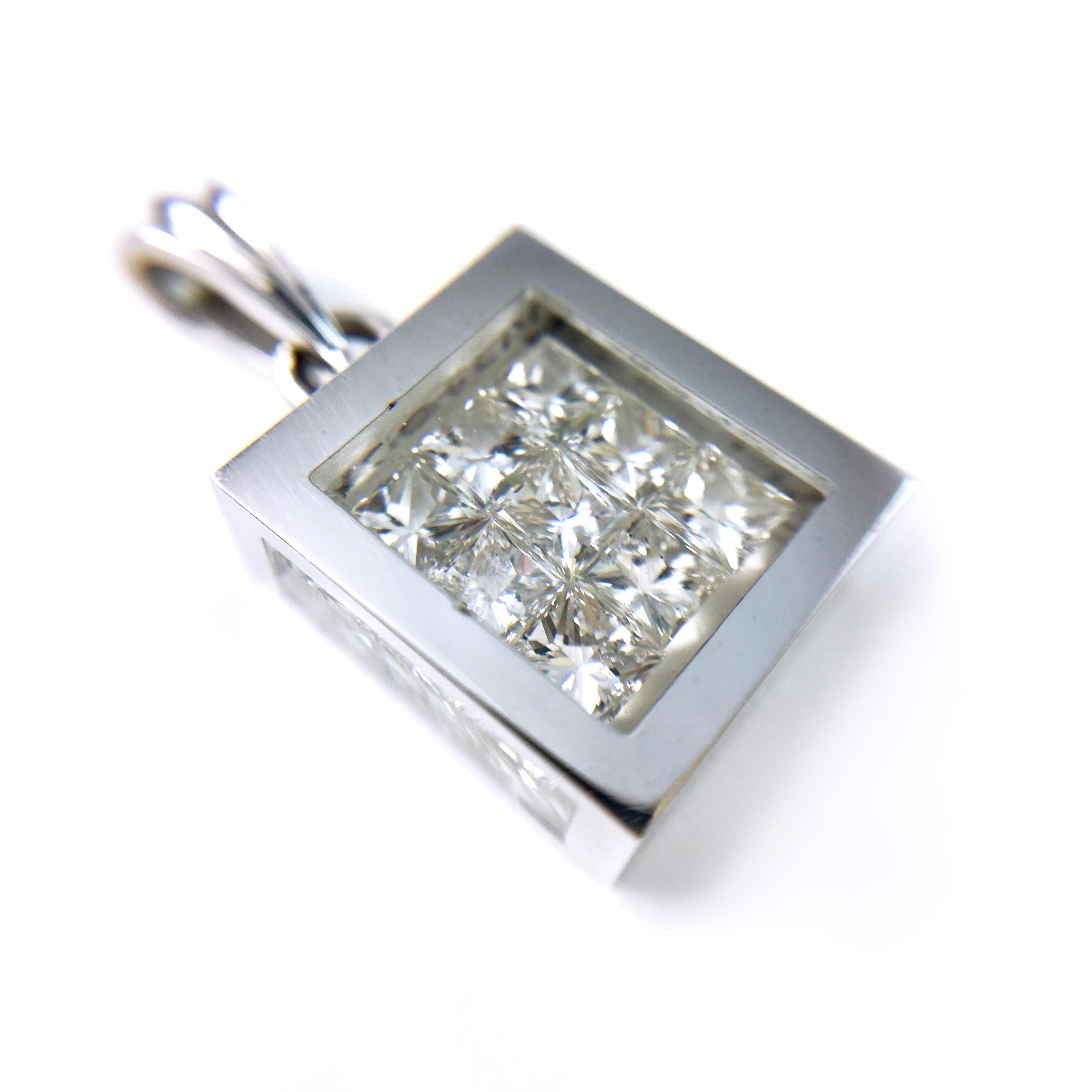 Incogem Floating Princess-Cut Diamond Pavé Pendant: 14K White Gold. The pendant is handcrafted of recycled 14k white gold. The nine diamonds are princess-cut, SI2 in clarity (G.I.A.), and G in color (G.I.A.). The total carat weight of the diamonds