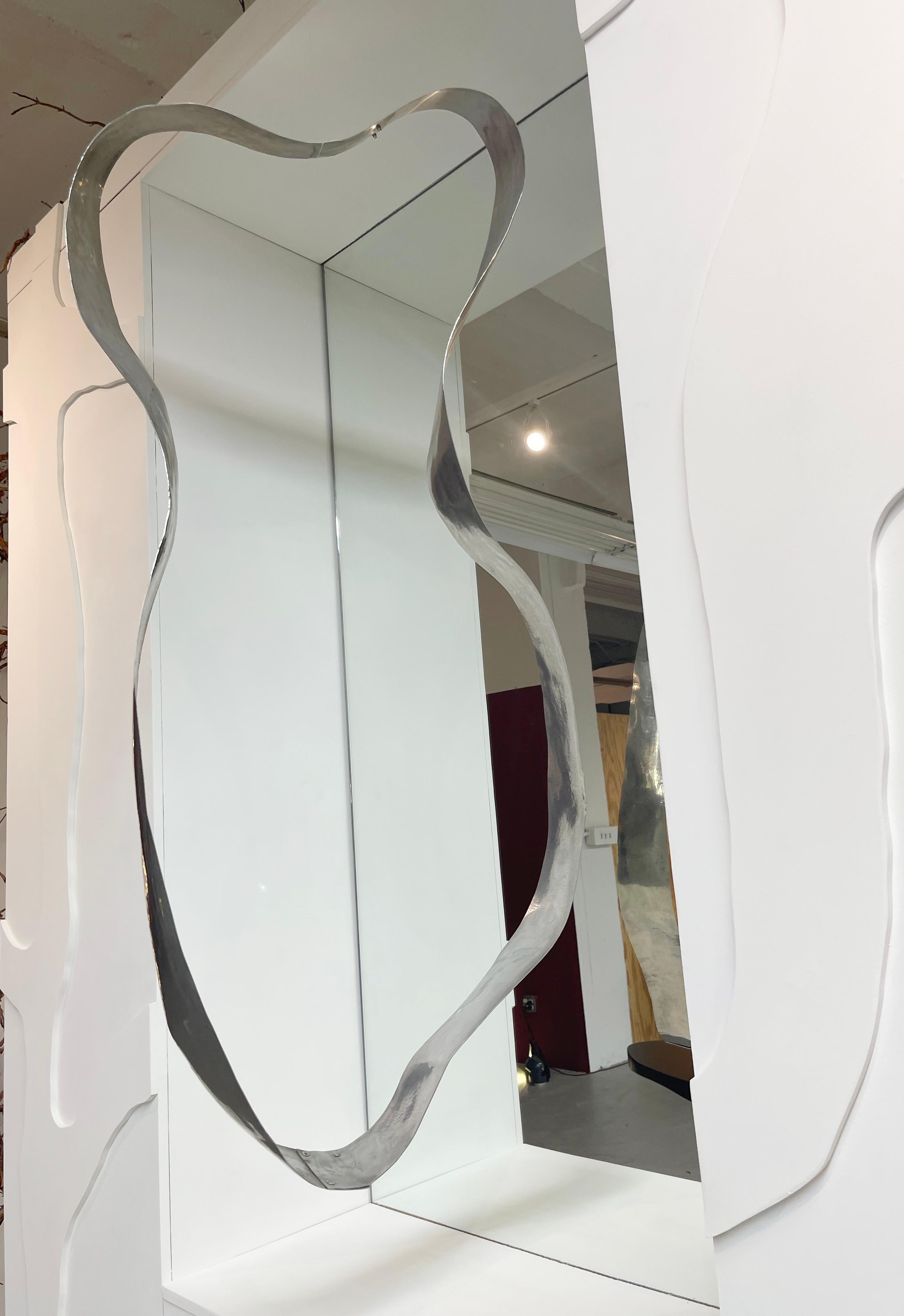 Hammered Floating sculpture mirror frame For Sale