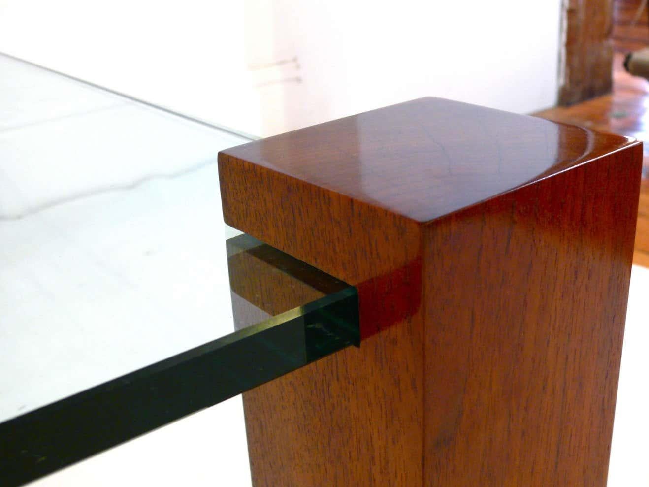 Floating walnut and glass coffee table legs. You are purchasing only the four legs.   Legs each measure 16