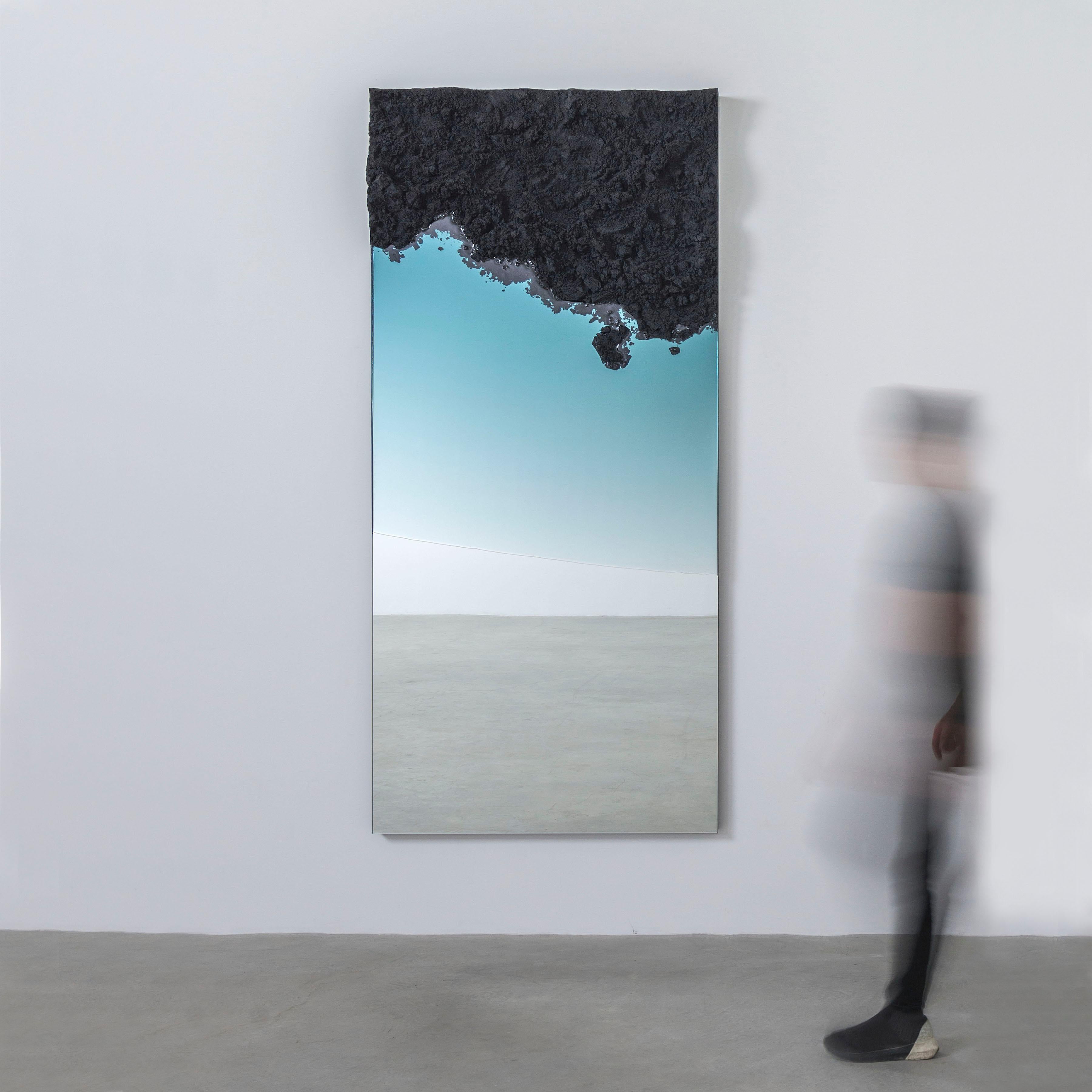 “Flood” is based on the rising waters across the globe, which are changing the physical landscape of our world. Although this mirror is made to look beautiful, Fernando has been haunted by these issues as the climate is changing right before our